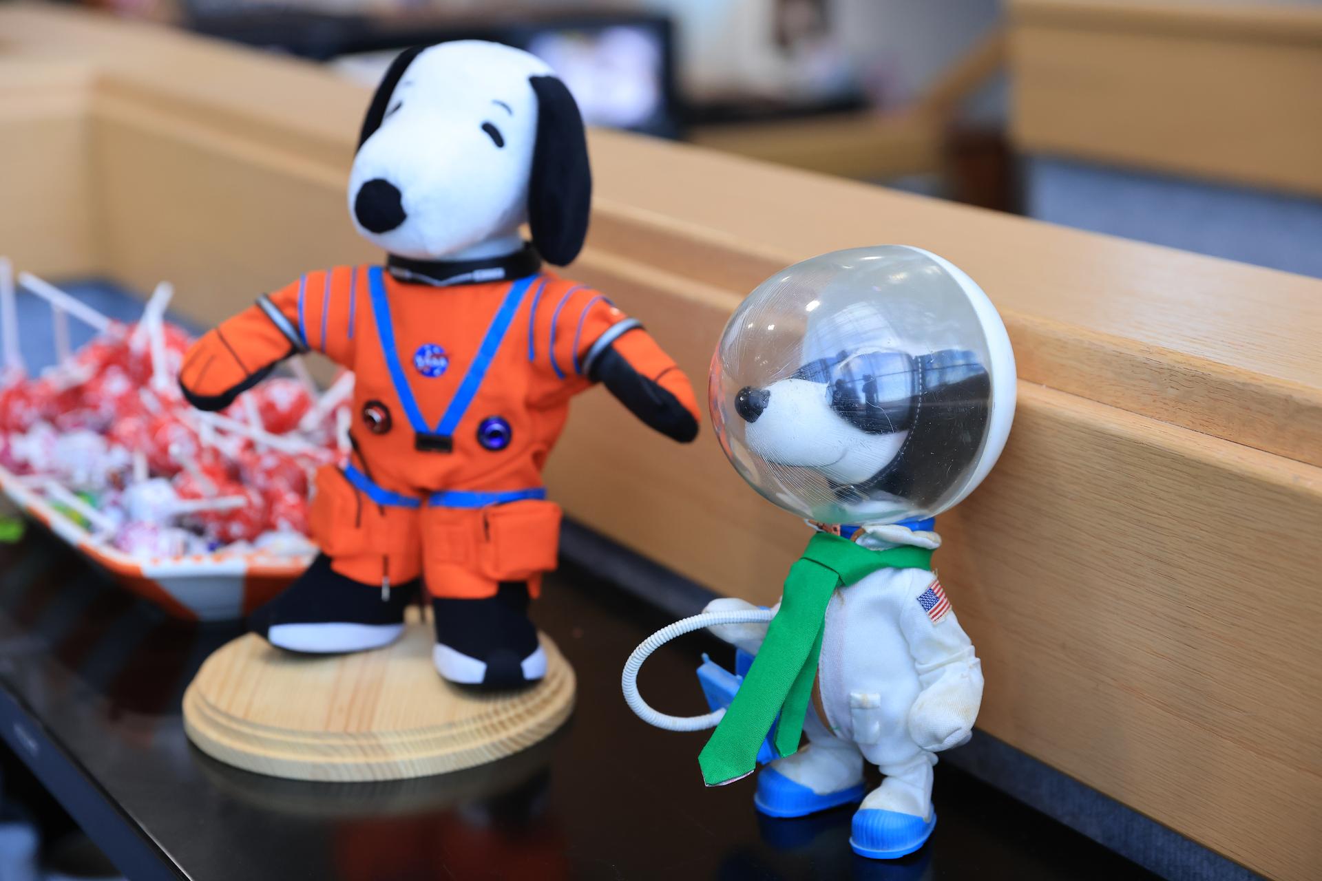 Astronaut Snoopy wearing its own Orion crew survival suit plush toy is on display inside Firing Room 1 of the Rocco Petrone Launch Control Center following the launch of the Artemis II test flight on Wednesday, April 1, 2026. Snoopy has been an official NASA mascot for over 50 years. The Artemis II mission launched Commander Reid Wiseman, Pilot Victor Glover, and Mission Specialist Christina Koch from NASA, and Mission Specialist Jeremy Hansen from the CSA (Canadian Space Agency), aboard NASA’s SLS (Space Launch System) rocket and Orion spacecraft to journey for 10 days around the Moon and back to Earth.