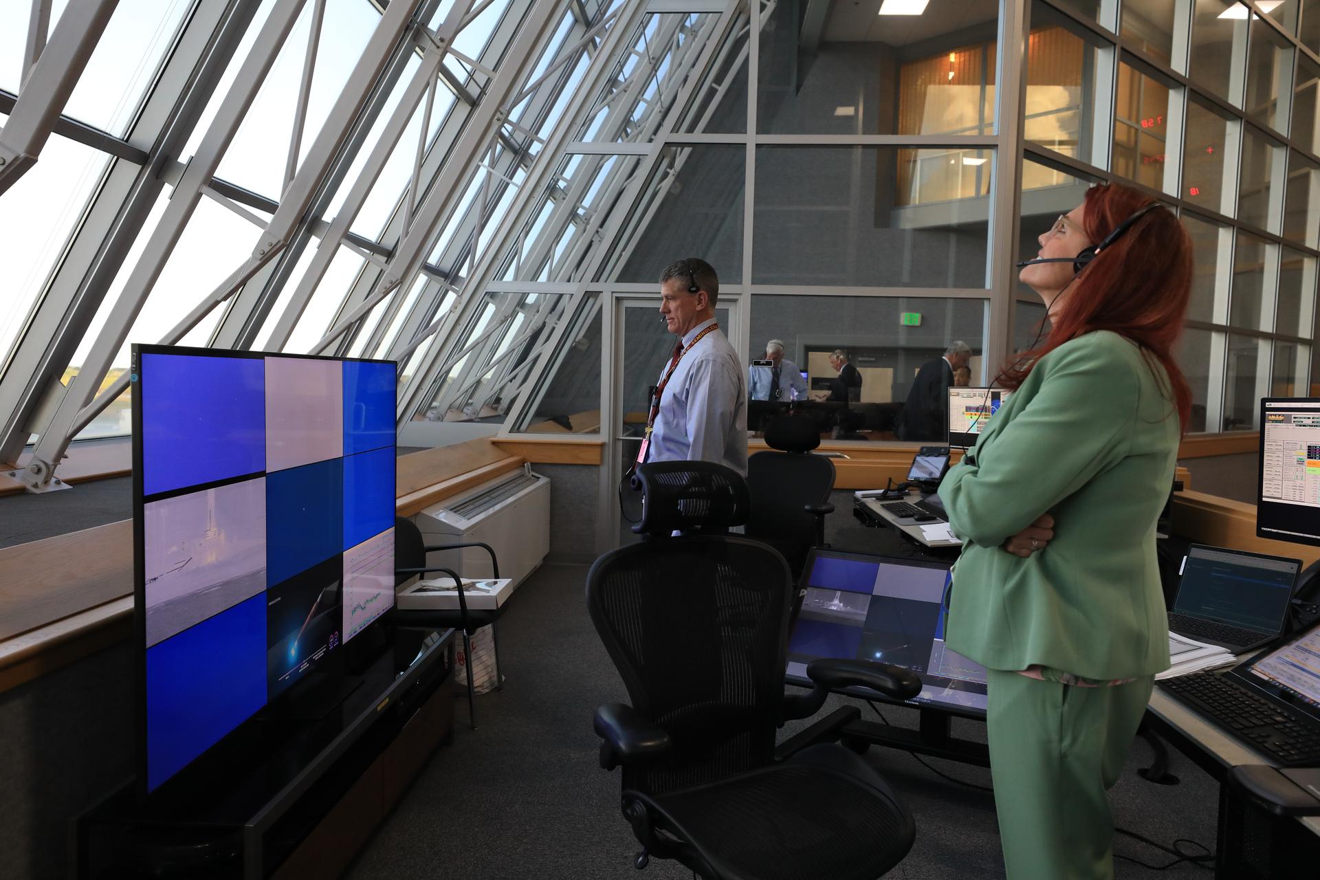 Charlie Blackwell-Thompson, Artemis launch director, and Jeremy Graeber, assistant launch director, each from NASA’s Exploration Ground Systems Program, watch the launch of NASA’s Artemis II test flight launch inside Firing Room 1 of the Rocco Petrone Launch Control Center on Wednesday, April 1, 2026. The Artemis II mission launched Commander Reid Wiseman, Pilot Victor Glover, and Mission Specialist Christina Koch from NASA, and Mission Specialist Jeremy Hansen from the CSA (Canadian Space Agency), aboard NASA’s SLS (Space Launch System) rocket and Orion spacecraft to journey for 10 days around the Moon and back to Earth.