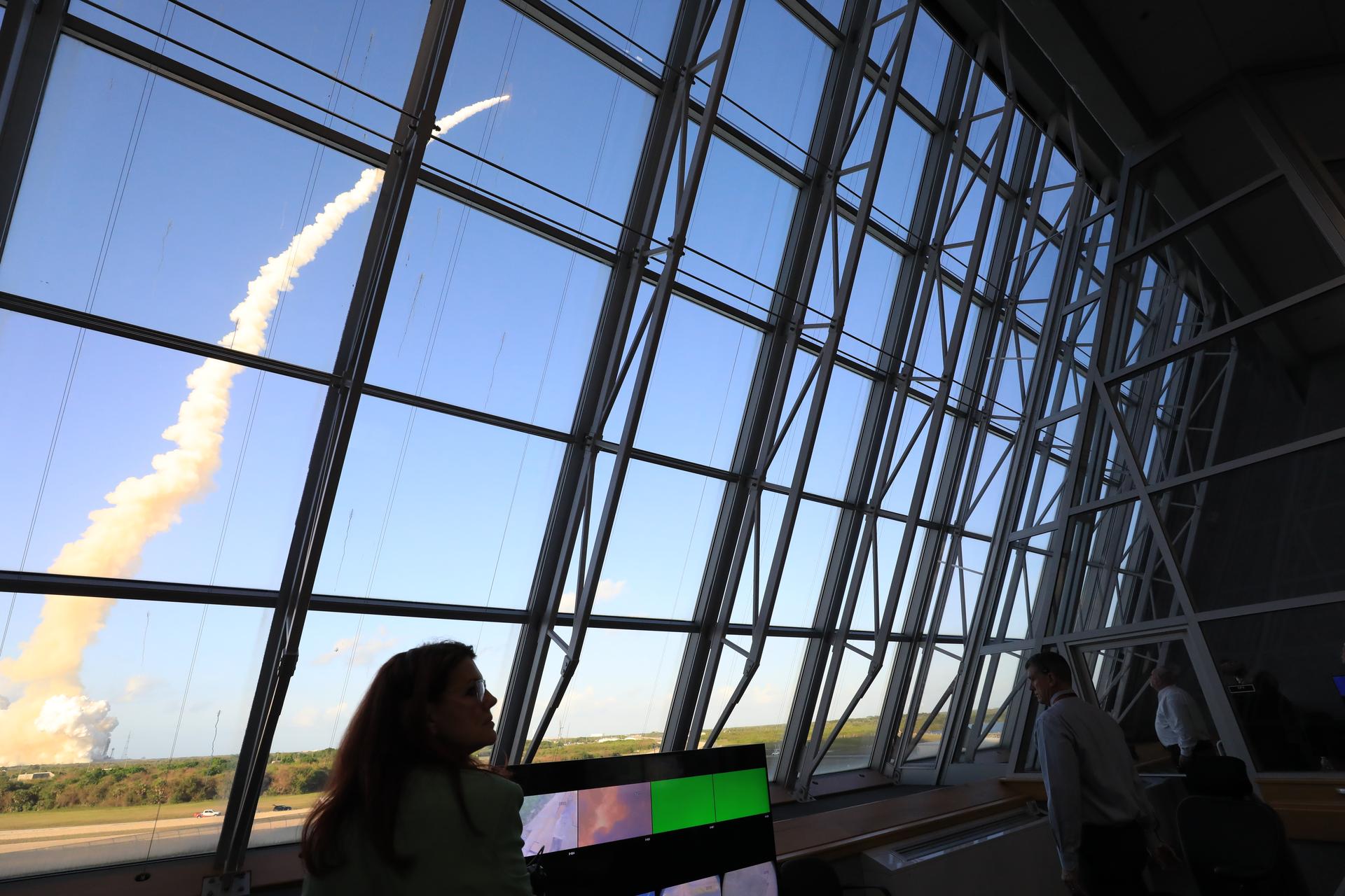 Charlie Blackwell-Thompson, Artemis launch director, and Jeremy Graeber, assistant launch director, each from NASA’s Exploration Ground Systems Program, watch the launch of NASA’s Artemis II test flight launch inside Firing Room 1 of the Rocco Petrone Launch Control Center on Wednesday, April 1, 2026. The Artemis II mission launched Commander Reid Wiseman, Pilot Victor Glover, and Mission Specialist Christina Koch from NASA, and Mission Specialist Jeremy Hansen from the CSA (Canadian Space Agency), aboard NASA’s SLS (Space Launch System) rocket and Orion spacecraft to journey for 10 days around the Moon and back to Earth.