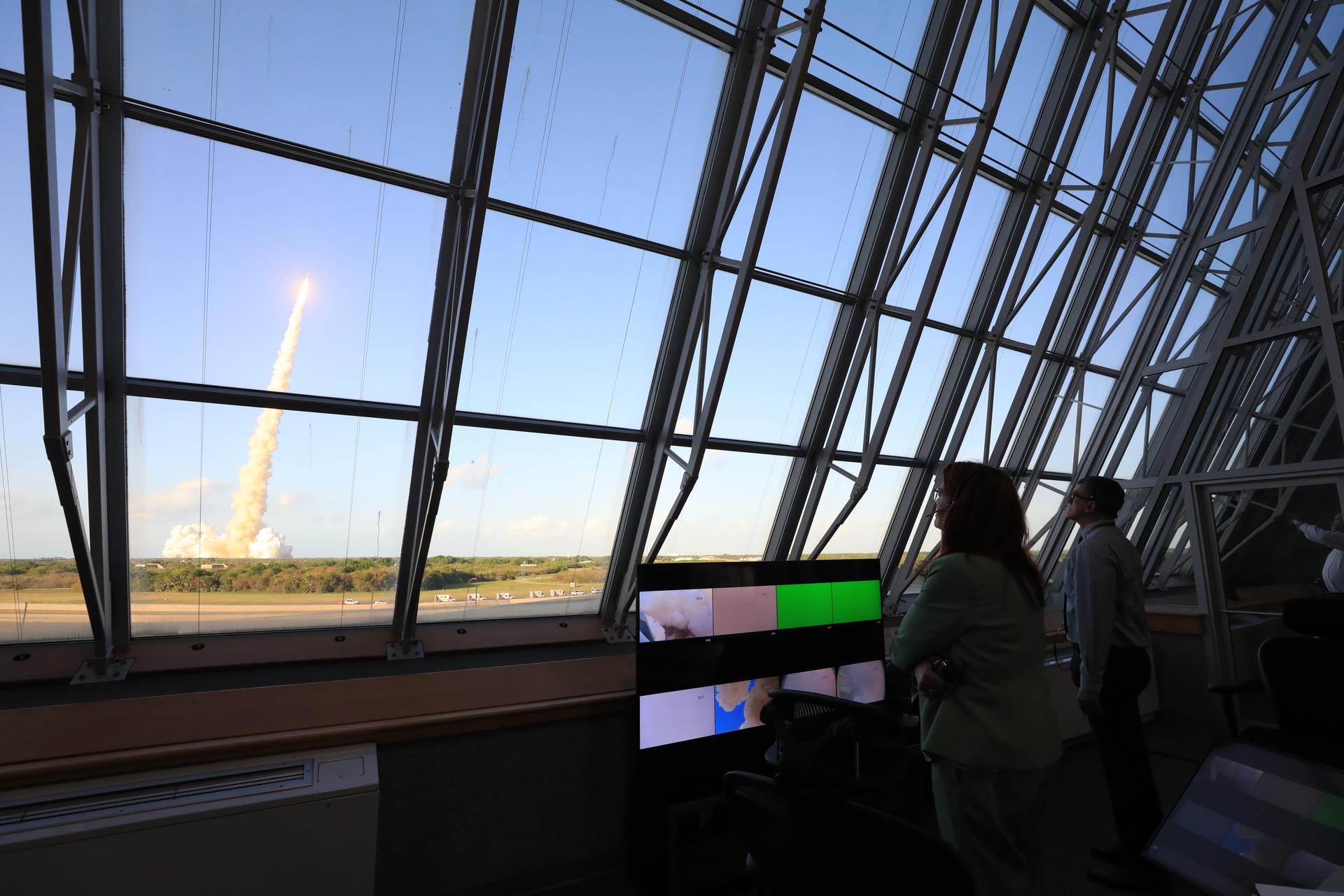 Charlie Blackwell-Thompson, Artemis launch director, and Jeremy Graeber, assistant launch director, each from NASA’s Exploration Ground Systems Program, watch the launch of NASA’s Artemis II test flight launch inside Firing Room 1 of the Rocco Petrone Launch Control Center on Wednesday, April 1, 2026. The Artemis II mission launched Commander Reid Wiseman, Pilot Victor Glover, and Mission Specialist Christina Koch from NASA, and Mission Specialist Jeremy Hansen from the CSA (Canadian Space Agency), aboard NASA’s SLS (Space Launch System) rocket and Orion spacecraft to journey for 10 days around the Moon and back to Earth.