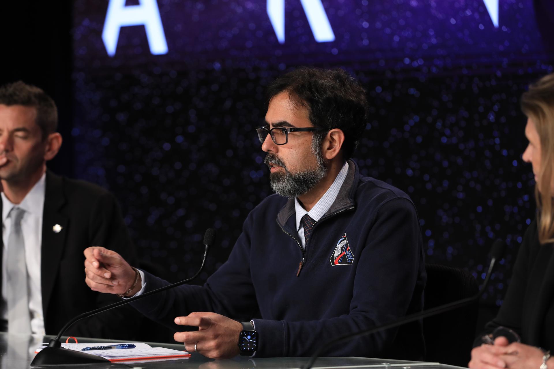 NASA Associate Administrator Amit Kshatriya participates in a news conference on Wednesday, April 1, 2026, inside the John Holliman Auditorium of the NASA News Center at the agency’s Kennedy Space Center in Florida to discuss the liftoff of the Artemis II test flight. The Artemis II test flight mission will take Artemis II Commander Reid Wiseman, Pilot Victor Glover, and Mission Specialist Christina Koch from NASA, and Mission Specialist Jeremy Hansen from the CSA (Canadian Space Agency) on a 10-day journey around the Moon and back. 
