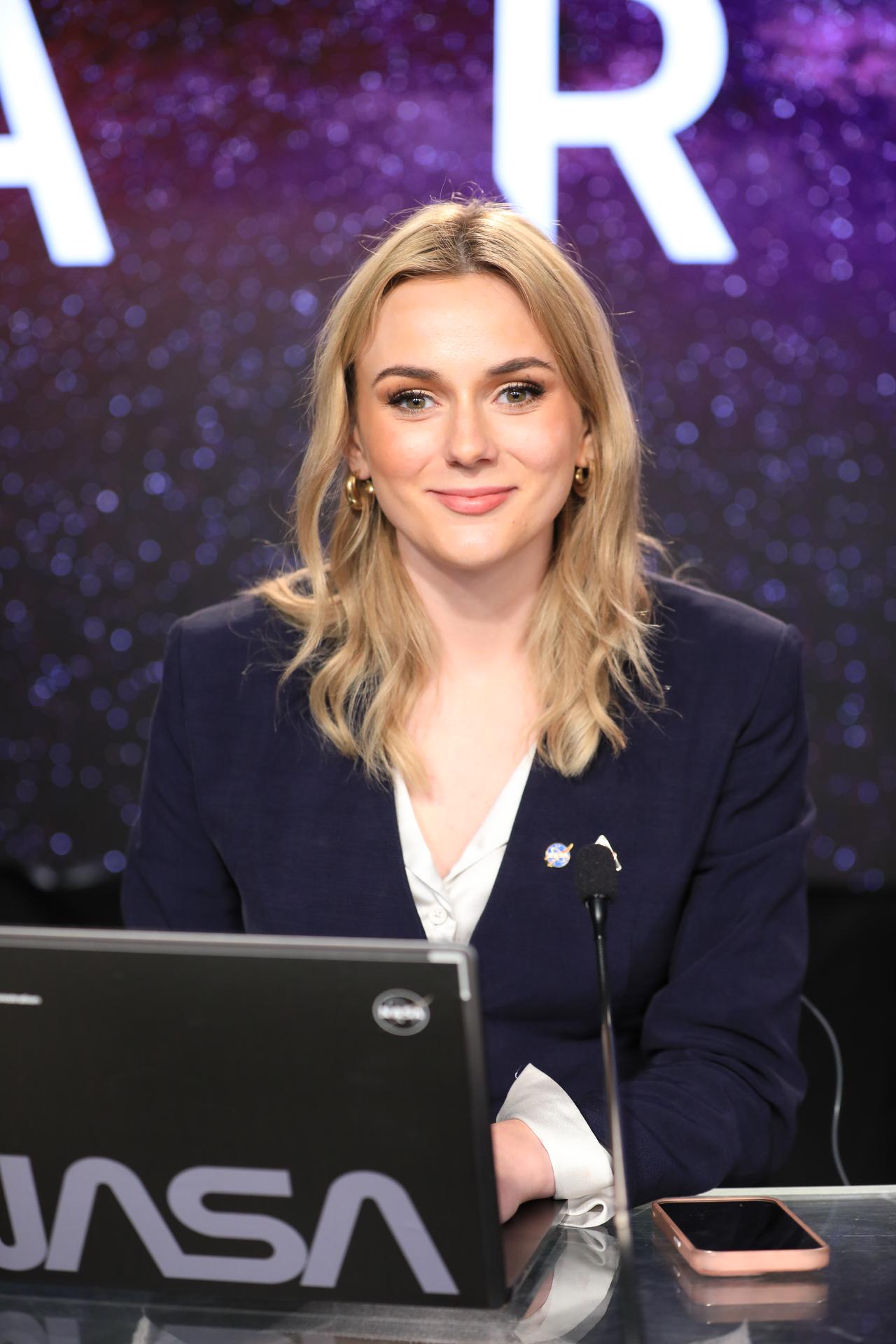 Bethany Stevens, NASA communications participates in a news conference on Wednesday, April 1, 2026, inside the John Holliman Auditorium of the NASA News Center at the agency’s Kennedy Space Center in Florida to discuss the liftoff of the Artemis II test flight. The Artemis II mission will take Artemis II Commander Reid Wiseman, Pilot Victor Glover, and Mission Specialist Christina Koch from NASA, and Mission Specialist Jeremy Hansen from the CSA (Canadian Space Agency) on a 10-day journey around the Moon and back. 