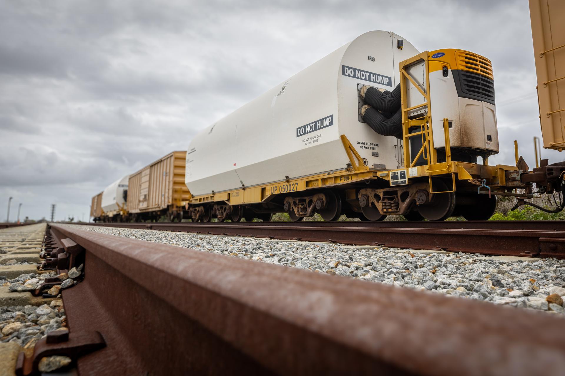 The solid rocket booster aft skirt segments for NASA’s Artemis III SLS (Space Launch System) rocket arrive at a rail yard near the agency’s Kennedy Space Center in Florida on Wednesday, April 8, 2026. Comprising the bottom of the rocket’s twin, five-segment solid rocket boosters, the aft skirt segments traveled by train in specialized transporters to the Florida spaceport and will be transferred from the rail yard to NASA Kennedy’s Rotation, Processing and Surge Facility for processing. The Artemis III mission will launch crew in the Orion spacecraft on top of the SLS rocket to test rendezvous and docking capabilities between Orion and commercial spacecraft needed to land astronauts on the Moon. 