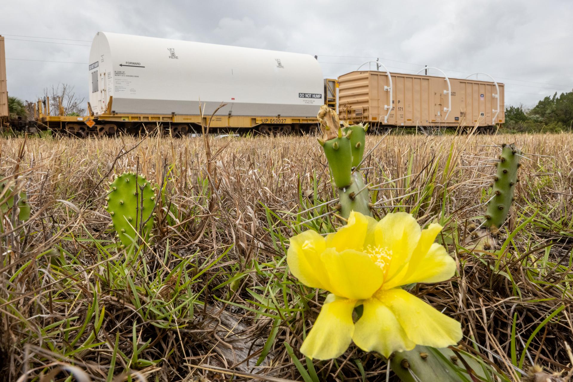 The solid rocket booster aft skirt segments for NASA’s Artemis III SLS (Space Launch System) rocket arrive at a rail yard near the agency’s Kennedy Space Center in Florida on Wednesday, April 8, 2026. Comprising the bottom of the rocket’s twin, five-segment solid rocket boosters, the aft skirt segments traveled by train in specialized transporters to the Florida spaceport and will be transferred from the rail yard to NASA Kennedy’s Rotation, Processing and Surge Facility for processing. The Artemis III mission will launch crew in the Orion spacecraft on top of the SLS rocket to test rendezvous and docking capabilities between Orion and commercial spacecraft needed to land astronauts on the Moon. 