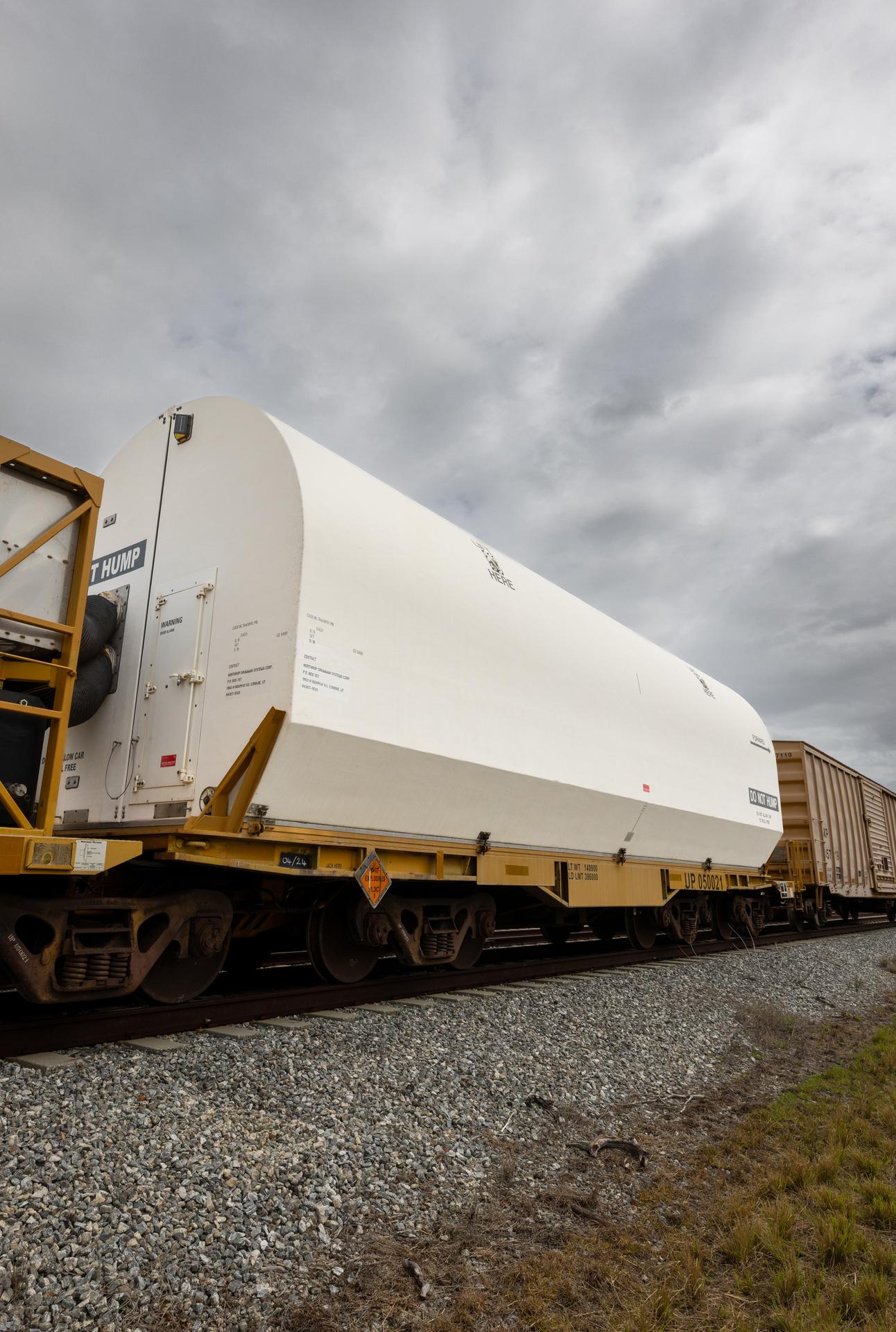 The solid rocket booster aft skirt segments for NASA’s Artemis III SLS (Space Launch System) rocket arrive at a rail yard near the agency’s Kennedy Space Center in Florida on Wednesday, April 8, 2026. Comprising the bottom of the rocket’s twin, five-segment solid rocket boosters, the aft skirt segments traveled by train in specialized transporters to the Florida spaceport and will be transferred from the rail yard to NASA Kennedy’s Rotation, Processing and Surge Facility for processing. The Artemis III mission will launch crew in the Orion spacecraft on top of the SLS rocket to test rendezvous and docking capabilities between Orion and commercial spacecraft needed to land astronauts on the Moon. 