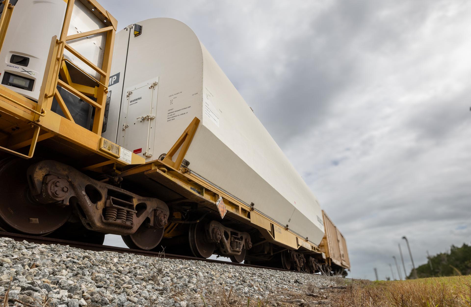 The solid rocket booster aft skirt segments for NASA’s Artemis III SLS (Space Launch System) rocket arrive at a rail yard near the agency’s Kennedy Space Center in Florida on Wednesday, April 8, 2026. Comprising the bottom of the rocket’s twin, five-segment solid rocket boosters, the aft skirt segments traveled by train in specialized transporters to the Florida spaceport and will be transferred from the rail yard to NASA Kennedy’s Rotation, Processing and Surge Facility for processing. The Artemis III mission will launch crew in the Orion spacecraft on top of the SLS rocket to test rendezvous and docking capabilities between Orion and commercial spacecraft needed to land astronauts on the Moon. 