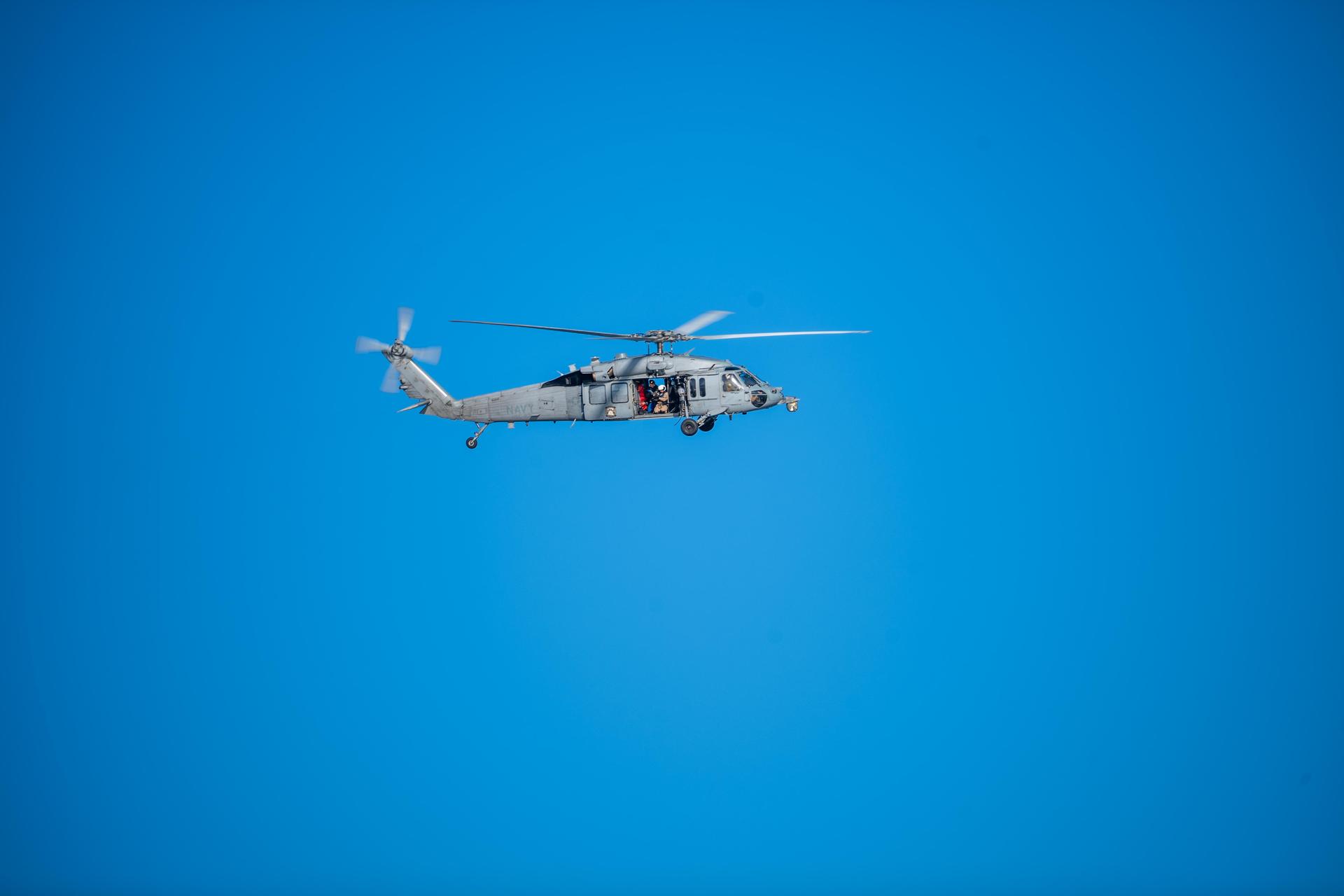 NASA’s Landing and Recovery team, the U.S. Navy, and Department of Defense aboard the USS John P. Murtha deploy H60-S Seahawk helicopter following the splashdown of NASA's Orion spacecraft carrying Artemis II Commander Reid Wiseman, Pilot Victor Glover, and Mission Specialist Christina Koch from NASA, along with Mission Specialist Jeremy Hansen from the CSA (Canadian Space Agency), in the Pacific Ocean near San Diego, California, at 5:07 p.m. PDT, (8:07 p.m. EDT) on Friday, April 10, 2026. The H60-S Seahawk helicopter will communicate Orion’s location back to USS John P. Murtha to coordinate efforts to recover Orion and secure the spacecraft in the well deck of the ship. The Artemis II test flight launched on Wednesday, April 1, from NASA’s Kennedy Space Center in Florida to begin its 10-day journey around the Moon for scientific discovery, economic benefits, and to build on our foundation for the first crewed missions to Mars.