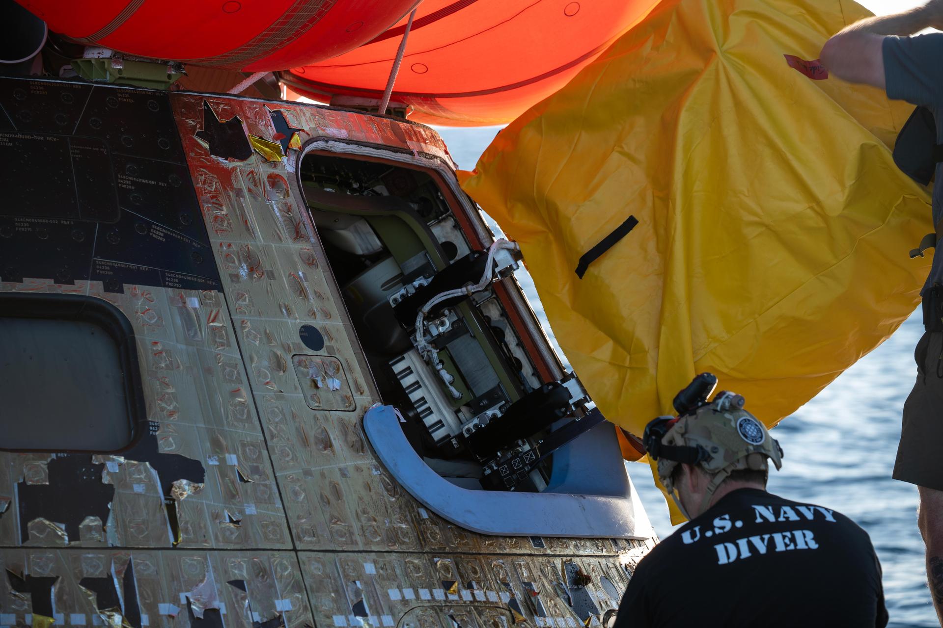 NASA’s Landing and Recovery team, along with U.S. Navy personnel aboard an inflatable raft approach NASA’s Orion spacecraft carrying Artemis II Commander Reid Wiseman, Pilot Victor Glover, and Mission Specialist Christina Koch from NASA, along with Mission Specialist Jeremy Hansen from the CSA (Canadian Space Agency), following splashdown in the Pacific Ocean near San Diego, California, at 5:07 p.m. PDT, (8:07 p.m. EDT) on Friday, April 10, 2026. The Artemis II test flight launched on Wednesday, April 1, from NASA’s Kennedy Space Center in Florida to begin its 10-day journey around the Moon for scientific discovery, economic benefits, and to build on our foundation for the first crewed missions to Mars. NASA’s Landing and Recovery team and the U.S. military are helping the Artemis II crew out of their Orion spacecraft. 