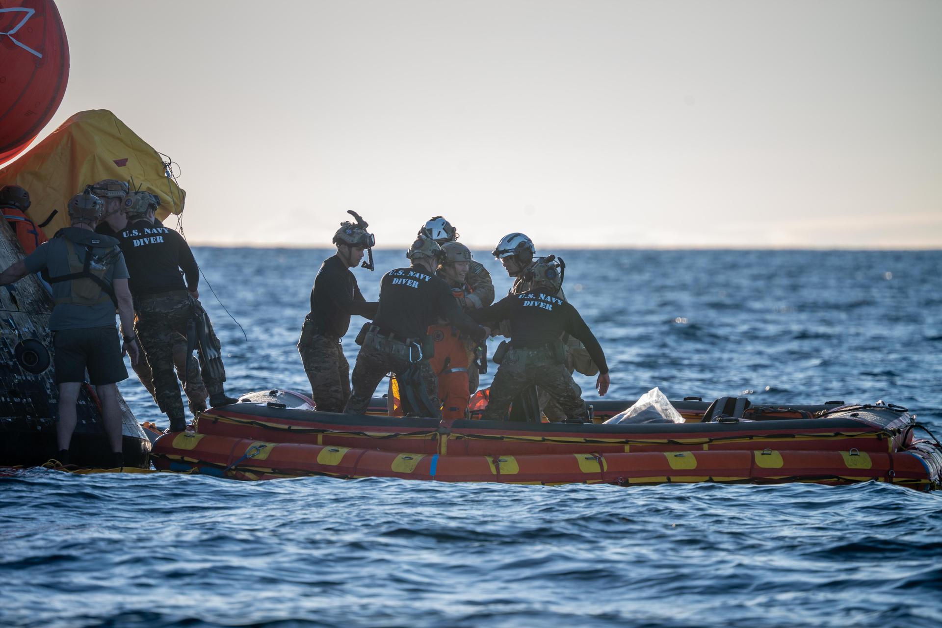Artemis II Mission Specialist Christina Koch, from NASA, is extracted from NASA’s Orion spacecraft and loaded onto an inflatable raft, called the front porch, following splashdown in the Pacific Ocean near San Diego, California, at 5:07 p.m. PDT, (8:07 p.m. EDT) on Friday, April 10, 2026. Koch and the other Artemis II crew will be taken to USS John P. Murtha to be routinely examined while NASA’s Landing and Recovery team and the U.S. Navy recover Orion and secure it in the well deck of the USS John P. Murtha. The Artemis II test flight launched on Wednesday, April 1, from NASA’s Kennedy Space Center in Florida to begin its 10-day journey around the Moon for scientific discovery, economic benefits, and to build on our foundation for the first crewed missions to Mars.