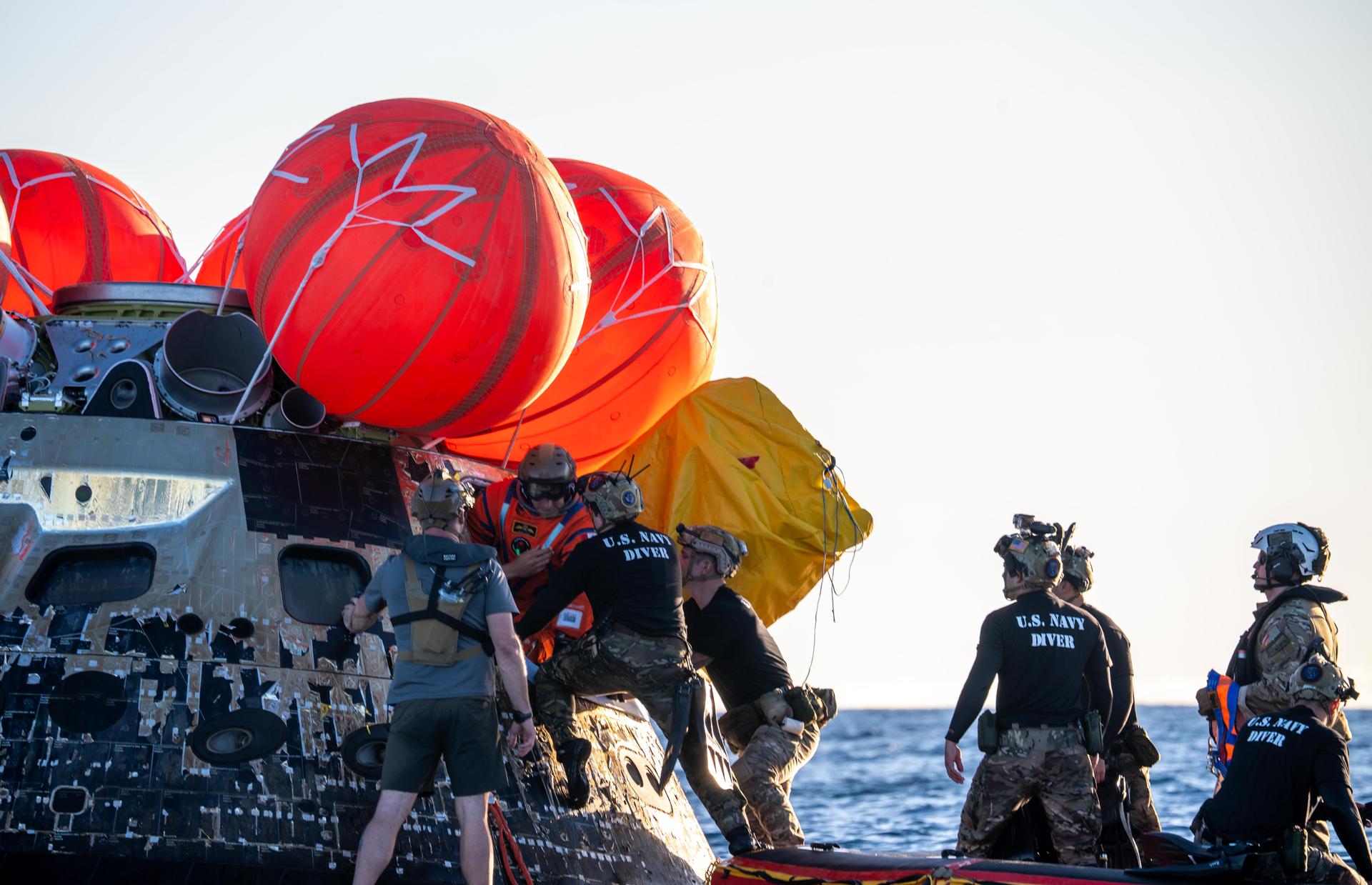 Artemis II Mission Specialist Jeremy Hansen, from the CSA (Canadian Space Agency), is extracted from NASA’s Orion spacecraft and loaded onto an inflatable raft, called the front porch, following splashdown in the Pacific Ocean near San Diego, California, at 5:07 p.m. PDT, (8:07 p.m. EDT) on Friday, April 10, 2026. Koch and the other Artemis II crew will be taken to USS John P. Murtha to be routinely examined while NASA’s Landing and Recovery team and the U.S. Navy recover Orion and secure it in the well deck of the USS John P. Murtha. The Artemis II test flight launched on Wednesday, April 1, from NASA’s Kennedy Space Center in Florida to begin its 10-day journey around the Moon for scientific discovery, economic benefits, and to build on our foundation for the first crewed missions to Mars.