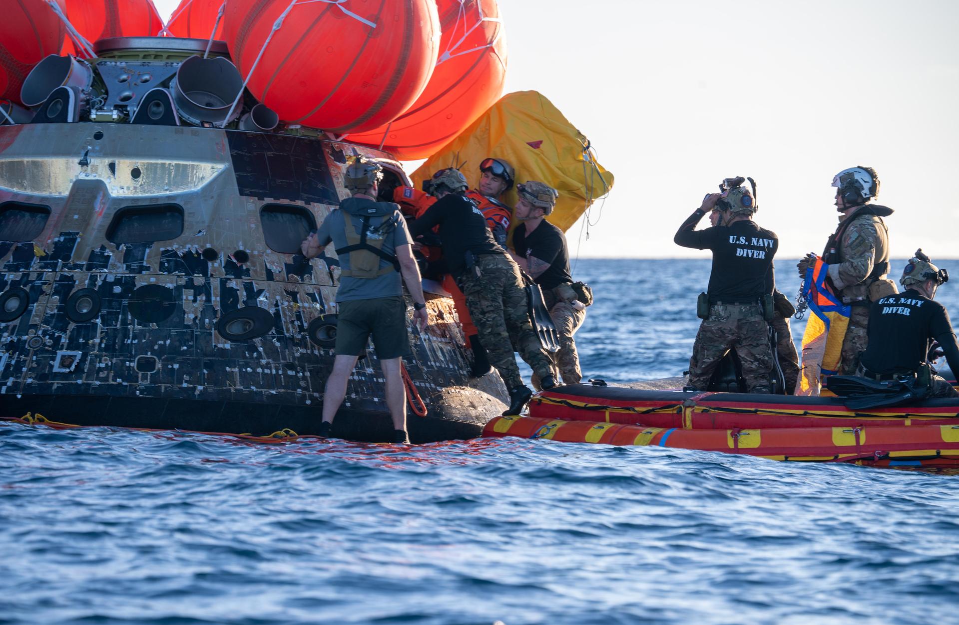 Artemis II Mission Specialist Jeremy Hansen, from the CSA (Canadian Space Agency), is extracted from NASA’s Orion spacecraft and loaded onto an inflatable raft, called the front porch, following splashdown in the Pacific Ocean near San Diego, California, at 5:07 p.m. PDT, (8:07 p.m. EDT) on Friday, April 10, 2026. Koch and the other Artemis II crew will be taken to USS John P. Murtha to be routinely examined while NASA’s Landing and Recovery team and the U.S. Navy recover Orion and secure it in the well deck of the USS John P. Murtha. The Artemis II test flight launched on Wednesday, April 1, from NASA’s Kennedy Space Center in Florida to begin its 10-day journey around the Moon for scientific discovery, economic benefits, and to build on our foundation for the first crewed missions to Mars.