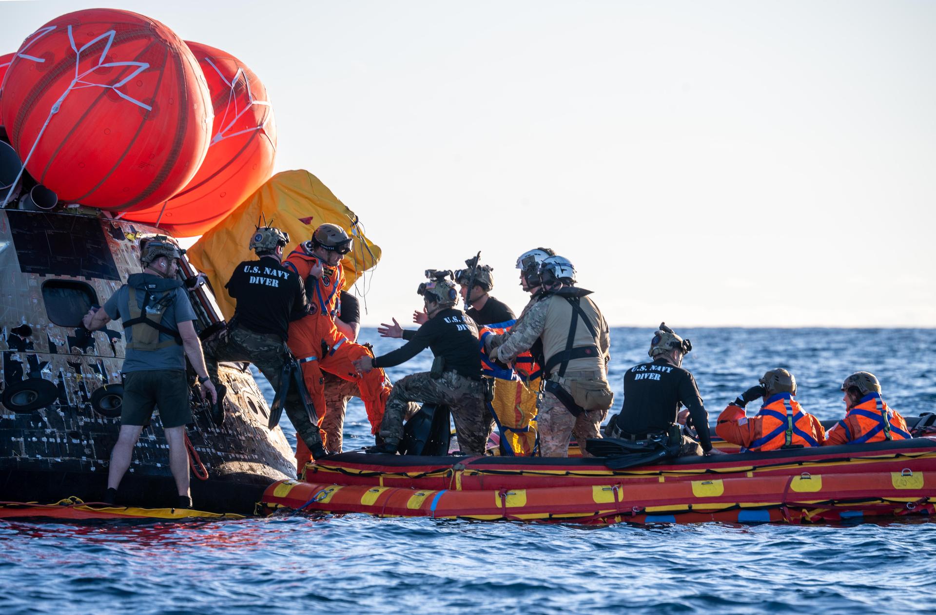 Artemis II Mission Specialist Jeremy Hansen, from the CSA (Canadian Space Agency), is extracted from NASA’s Orion spacecraft and loaded onto an inflatable raft, called the front porch, following splashdown in the Pacific Ocean near San Diego, California, at 5:07 p.m. PDT, (8:07 p.m. EDT) on Friday, April 10, 2026. Koch and the other Artemis II crew will be taken to USS John P. Murtha to be routinely examined while NASA’s Landing and Recovery team and the U.S. Navy recover Orion and secure it in the well deck of the USS John P. Murtha. The Artemis II test flight launched on Wednesday, April 1, from NASA’s Kennedy Space Center in Florida to begin its 10-day journey around the Moon for scientific discovery, economic benefits, and to build on our foundation for the first crewed missions to Mars.