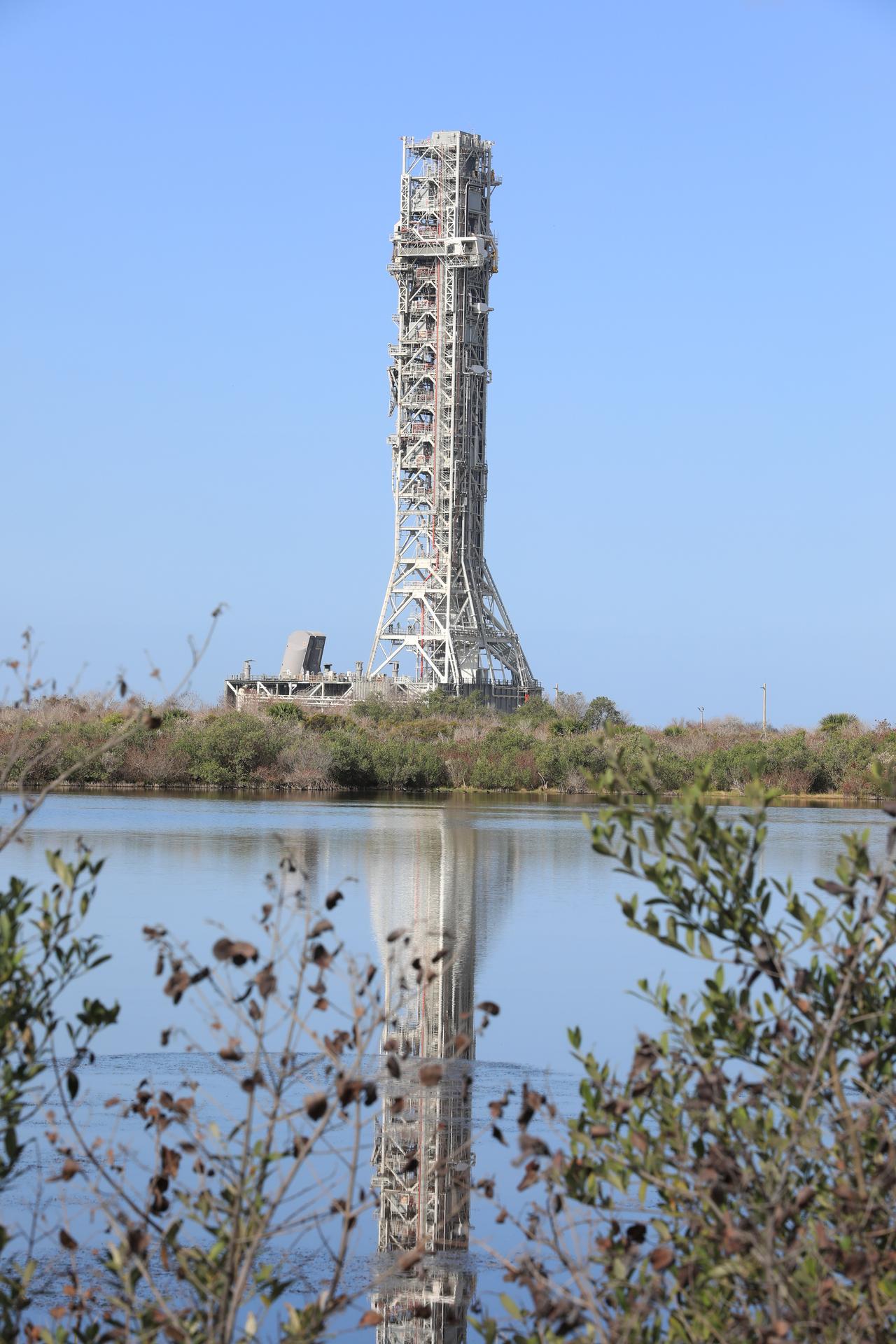 NASA’s mobile launcher 1 begins its approximately 4-mile trek from Launch Complex 39B to the Vehicle Assembly Building at the agency’s Kennedy Space Center in Florida on Thursday, April 16, 2026, in preparation for Artemis III stacking operations. Teams will perform checkouts, inspections, and data analysis, and make repairs to the tower that saw damage during liftoff of the Artemis II test flight.  