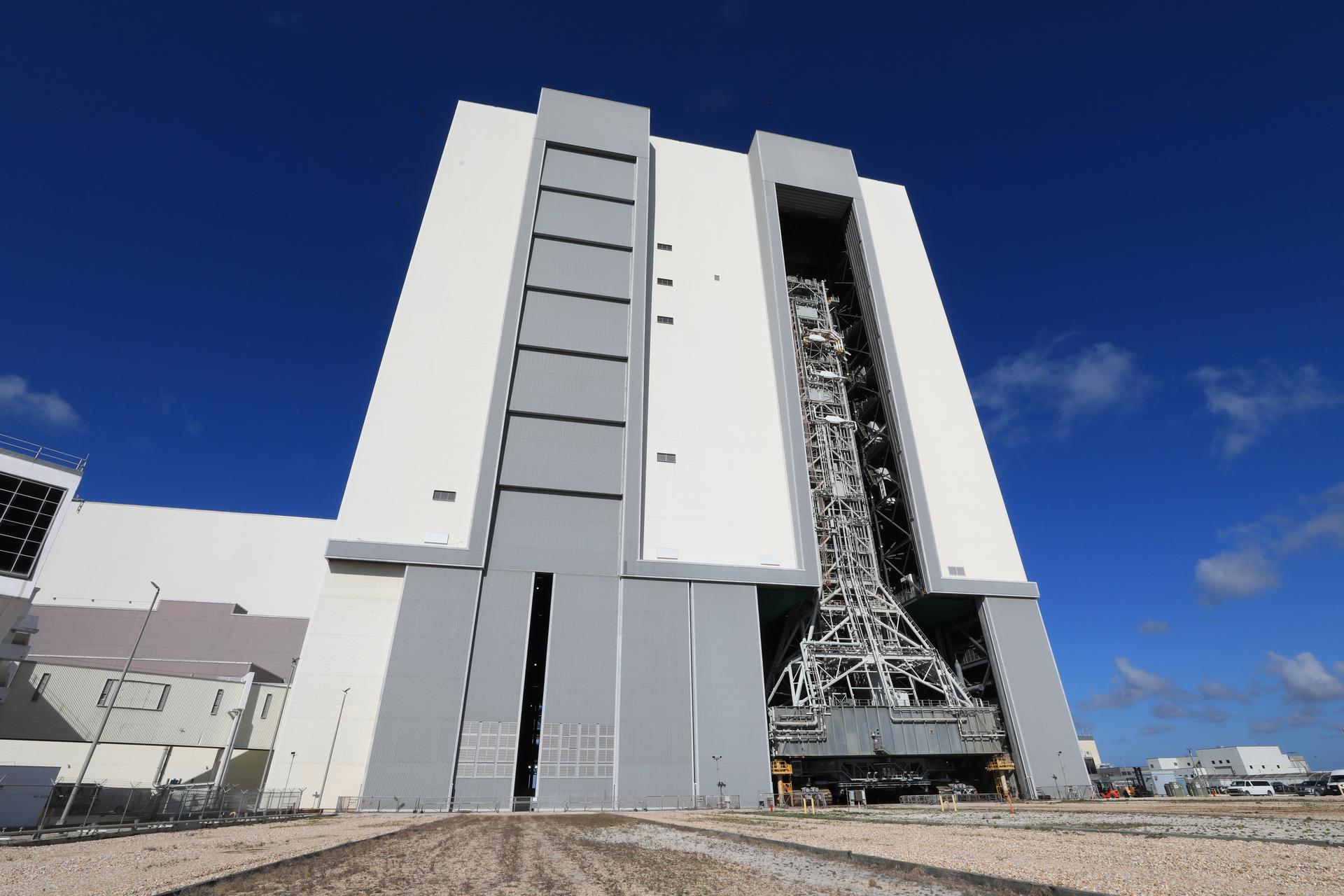NASA’s mobile launcher enters the Vehicle Assembly Building following its approximately 4-mile trek from Launch Complex 39B at the agency’s Kennedy Space Center in Florida on Friday, April 17, 2026, in preparation for Artemis III stacking operations. Teams will perform checkouts, inspections, and data analysis, and make repairs to the tower that saw damage during launch of NASA’s Artemis II test flight on April 1, 2026.  