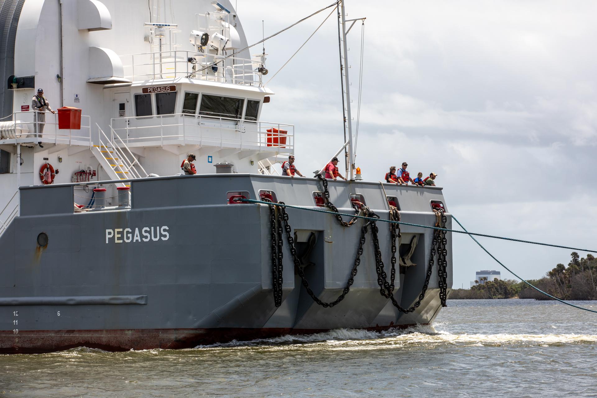 NASA’s Pegasus barge, carrying the top four-fifths of the agency’s SLS (Space Launch System) core stage for the Artemis III mission, arrives at NASA’s Kennedy Space Center Complex 39 turn basin wharf in Florida on Monday, April 27, 2026. Artemis III will launch astronauts to Earth’s orbit aboard the Orion spacecraft on top of SLS to test rendezvous and docking capabilities between Orion and commercial spacecraft needed to land Artemis IV astronauts on the Moon in 2028. 