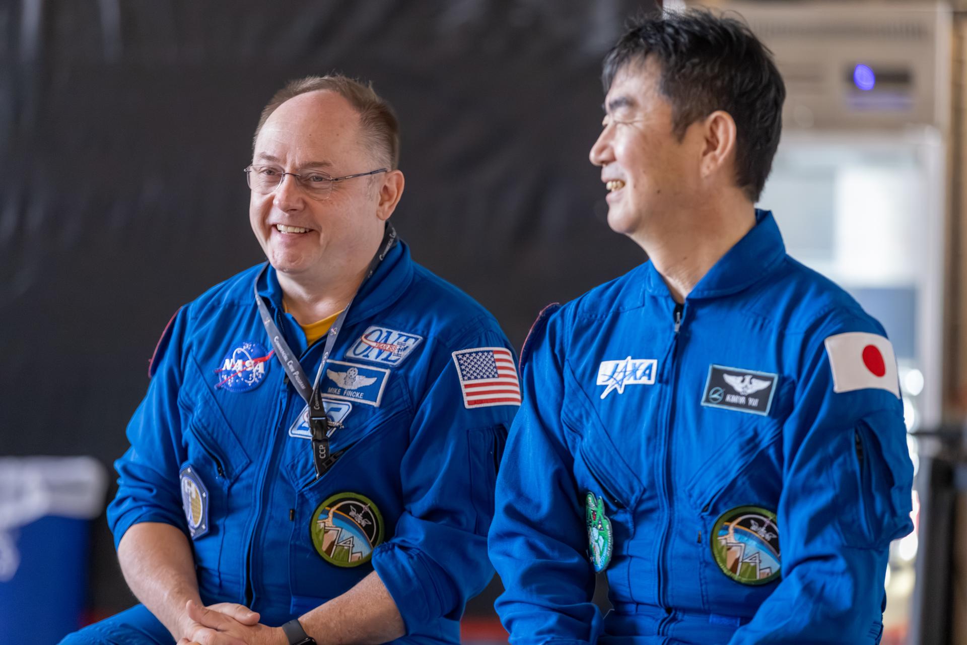 From left, NASA astronaut Mike Fincke and JAXA (Japan Aerospace Exploration Agency) astronaut Kimiya Yui speak to employees during a visit to NASA’s Kennedy Space Center in Florida on Thursday, June 11, 2026. Fincke and Yui, along with NASA astronaut Zena Cardman and Roscosmos cosmonaut Oleg Platonov, spent five and a half months aboard the International Space Station.