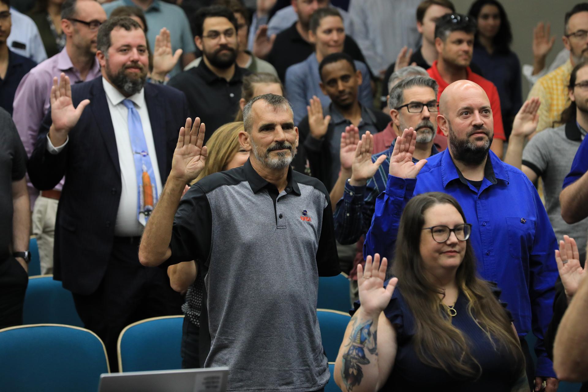New employees were sworn in on Monday, June 15, 2026, as new NASA civil servants at the agency’s Kennedy Space Center in Florida. The 138 employees from NASA Kennedy and Vandenberg Space Force Base in California are the latest onboarded as part of NASA Administrator Jared Isaacman’s workforce directive ongoing efforts to strengthen core capabilities, support mission success, and increase NASA’s agility, and they are taking on duties recently fulfilled by the Expendable Launch Vehicle Integrated Support (ELVIS) contract.