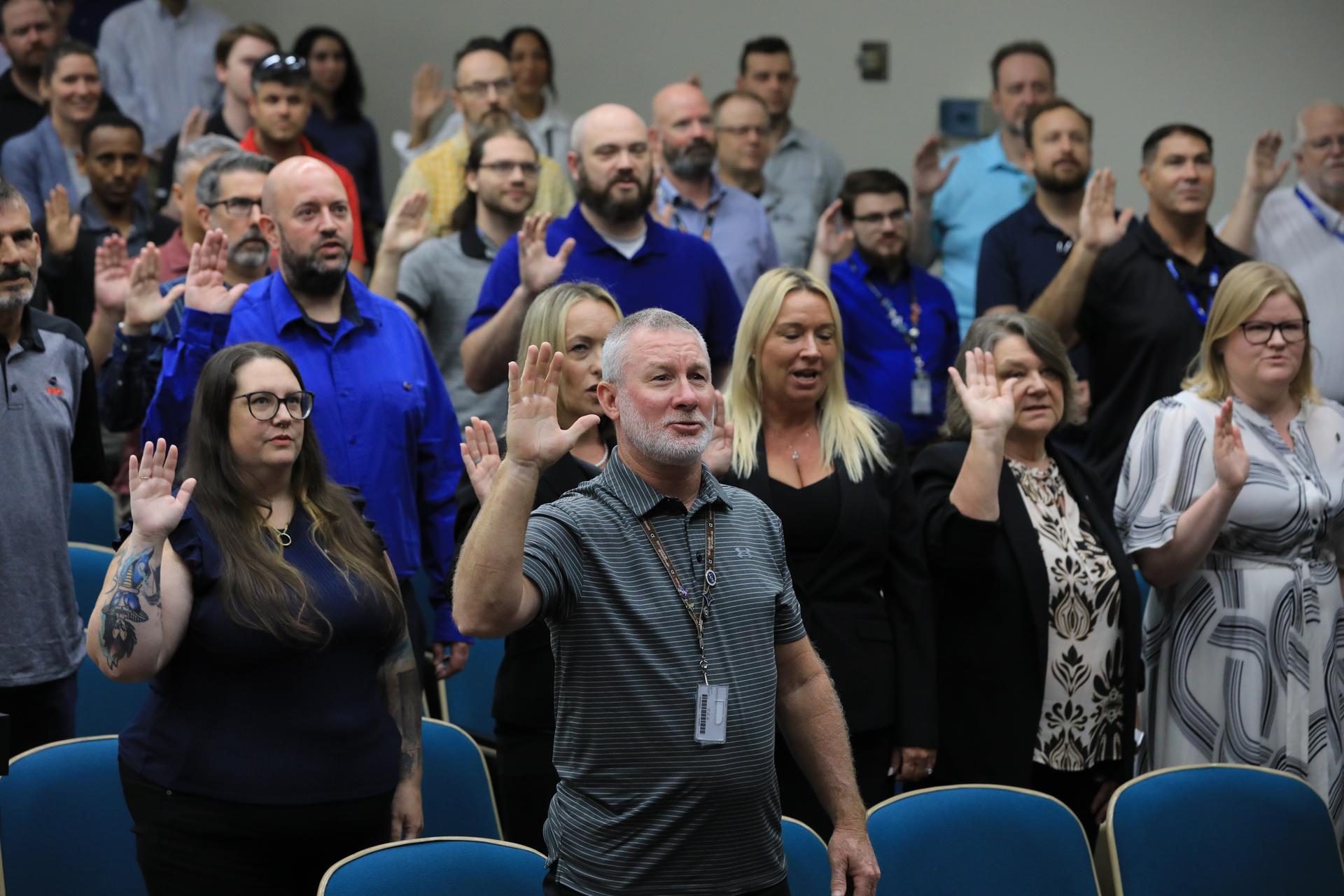 New employees were sworn in on Monday, June 15, 2026, as new NASA civil servants at the agency’s Kennedy Space Center in Florida. The 138 employees from NASA Kennedy and Vandenberg Space Force Base in California are the latest onboarded as part of NASA Administrator Jared Isaacman’s workforce directive ongoing efforts to strengthen core capabilities, support mission success, and increase NASA’s agility, and they are taking on duties recently fulfilled by the Expendable Launch Vehicle Integrated Support (ELVIS) contract.