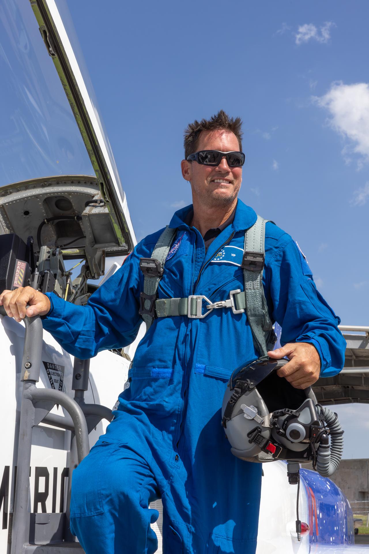 NASA employee Charles Meilbye climbs into one of NASA Administrator Jared Isaacman’s personal F-5 aircraft, as part of the Administrator’s Flight Experience Award program on Wednesday, June 17, 2026, at the Launch and Landing Facility at the agency’s Kennedy Space Center in Florida. Multiple NASA awardees donned NASA flight suits, completed preflight briefings, and experienced a unique flight aboard the administrator’s personal F-5 aircraft. The ride-along flight experience award program highlights NASA’s commitment to celebrating excellence across the workforce.