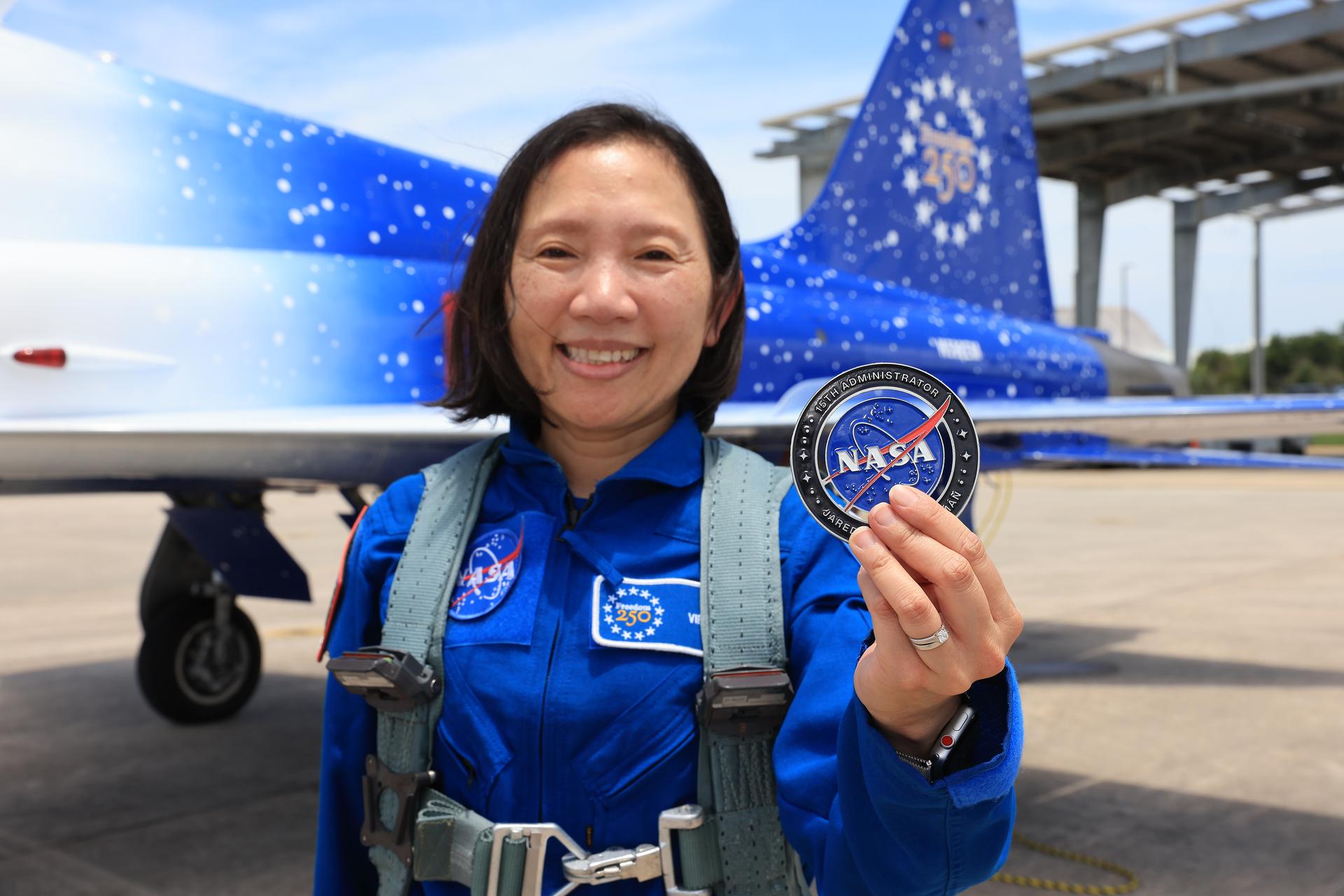 NASA employee Kuo-Chia “Alice” Liu is recognized as part of NASA Administrator Jared Isaacman’s Flight Experience Award program on Thursday, June 18, 2026, at the Launch and Landing Facility at the agency’s Kennedy Space Center in Florida. Liu, with other awardees, suited up, completed pre-flight briefings, and experienced a unique flight aboard the administrator’s personal F-5 aircraft. The ride-along flight experience award program highlights NASA’s commitment to celebrating excellence across the workforce.