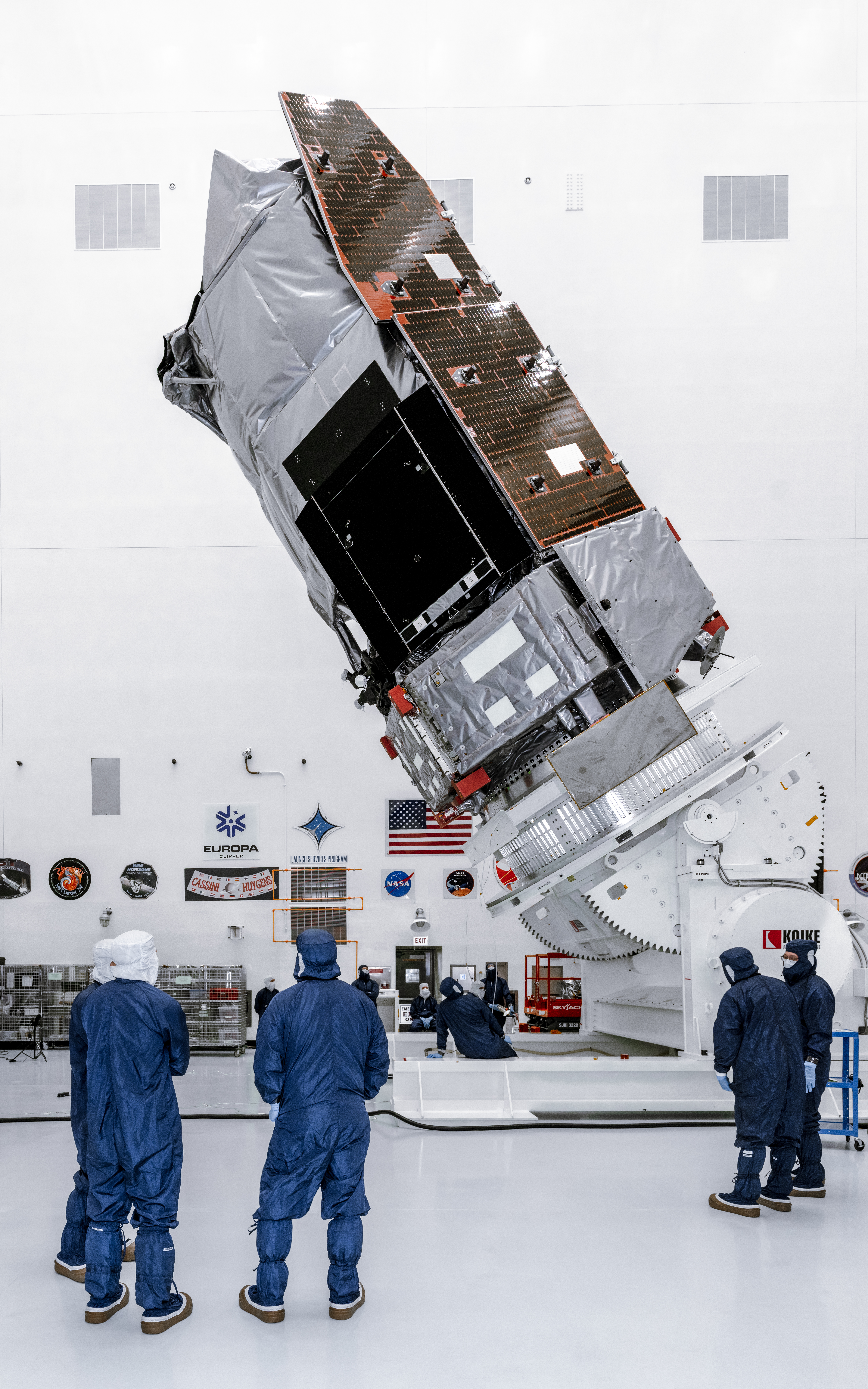 Technicians rotate NASA's Nancy Grace Roman Space Telescope to a vertical position at Kennedy Space Center
