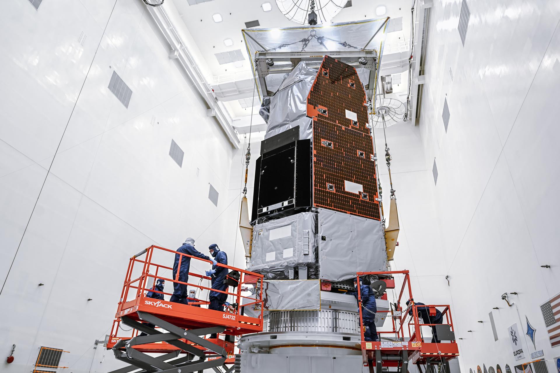 Technicians and engineers inside the Payload Hazardous Servicing Facility at NASA’s Kennedy Space Center in Florida use a crane to lift the agency’s Nancy Grace Roman Space Telescope to a specialized work stand Friday, June 26, 2026. Named for NASA’s first chief astronomer and “mother of the Hubble Space Telescope,” the Roman Space Telescope will offer a field of view at least 100 times larger than Hubble’s, resulting in deep, sweeping explorations of the cosmos.
