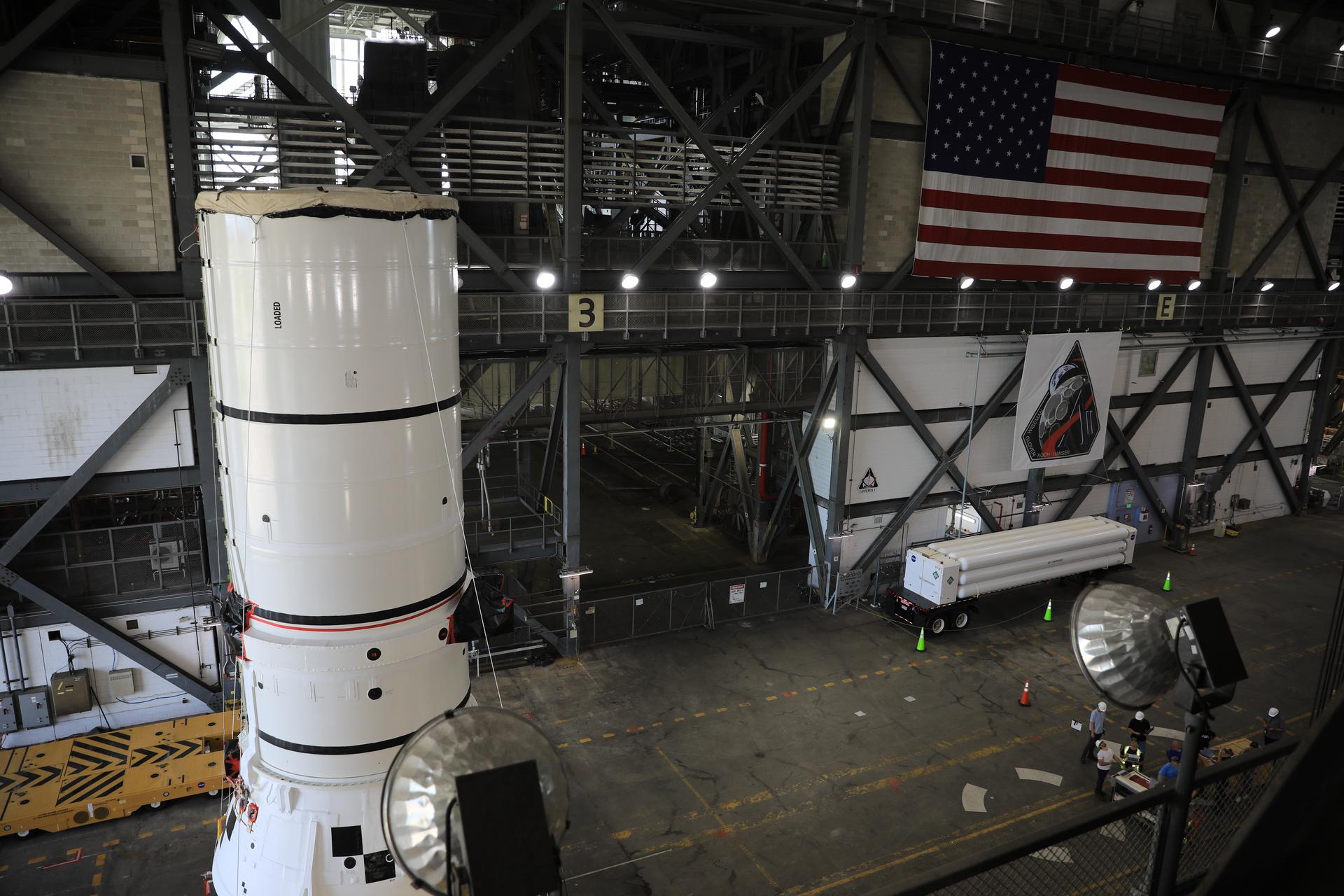 The left-hand aft assembly solid rocket booster segment for NASA’s Artemis III SLS (Space Launch System) rocket arrives at the agency’s Vehicle Assembly Building at NASA’s Kennedy Space Center in Florida on Monday, July 6, 2026, ahead of stacking on top of the mobile launcher for the Artemis III mission. The twin boosters, manufactured by Northrop Grumman in Utah, will provide more than 75 percent of the SLS rocket’s total thrust at launch. The Artemis III mission will launch crew in the Orion spacecraft on top of the SLS rocket to test rendezvous and docking capabilities between Orion and commercial spacecraft needed to land astronauts on the Moon.