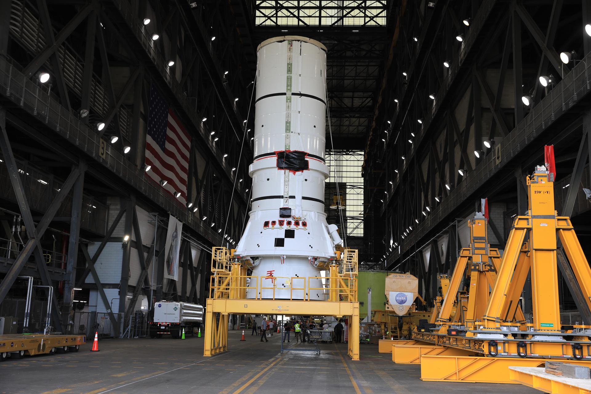 The left-hand aft assembly solid rocket booster segment for NASA’s Artemis III SLS (Space Launch System) rocket arrives at the agency’s Vehicle Assembly Building at NASA’s Kennedy Space Center in Florida on Monday, July 6, 2026, ahead of stacking on top of the mobile launcher for the Artemis III mission. The twin boosters, manufactured by Northrop Grumman in Utah, will provide more than 75 percent of the SLS rocket’s total thrust at launch. The Artemis III mission will launch crew in the Orion spacecraft on top of the SLS rocket to test rendezvous and docking capabilities between Orion and commercial spacecraft needed to land astronauts on the Moon.