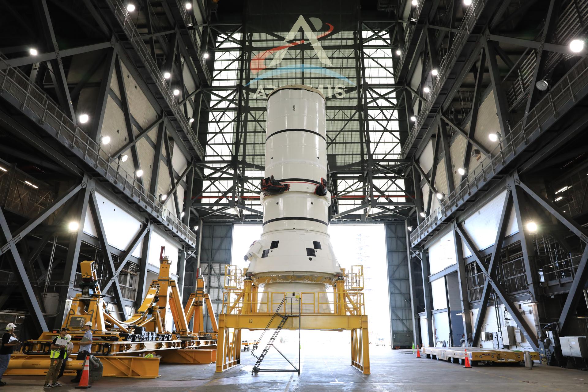 The left-hand aft assembly solid rocket booster segment for NASA’s Artemis III SLS (Space Launch System) rocket arrives at the agency’s Vehicle Assembly Building at NASA’s Kennedy Space Center in Florida on Monday, July 6, 2026, ahead of stacking on top of the mobile launcher for the Artemis III mission. The twin boosters, manufactured by Northrop Grumman in Utah, will provide more than 75 percent of the SLS rocket’s total thrust at launch. The Artemis III mission will launch crew in the Orion spacecraft on top of the SLS rocket to test rendezvous and docking capabilities between Orion and commercial spacecraft needed to land astronauts on the Moon.