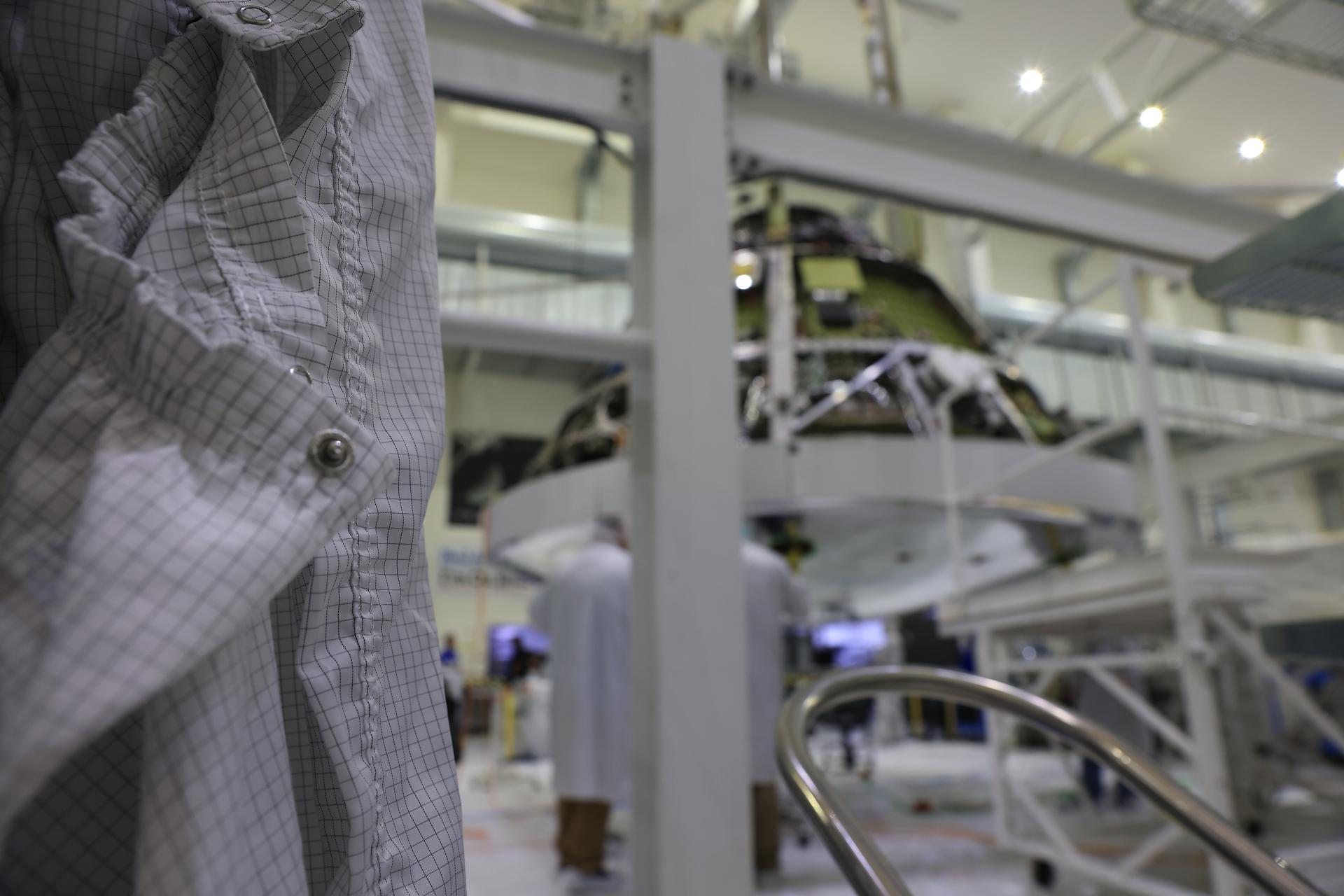 Teams work to complete the installation of the heat shield on the Artemis III Orion spacecraft inside the high bay of the Neil A. Armstrong Operations and Checkout Building at NASA’s Kennedy Space Center in Florida on Monday, July 6, 2026. Orion’s heat shield consists of 186 blocks of an ablative material called Avcoat, with each block meticulously and individually inspected. The heat shield is responsible for protecting the astronauts from the extreme temperatures as they reenter Earth’s atmosphere at the end of the mission.