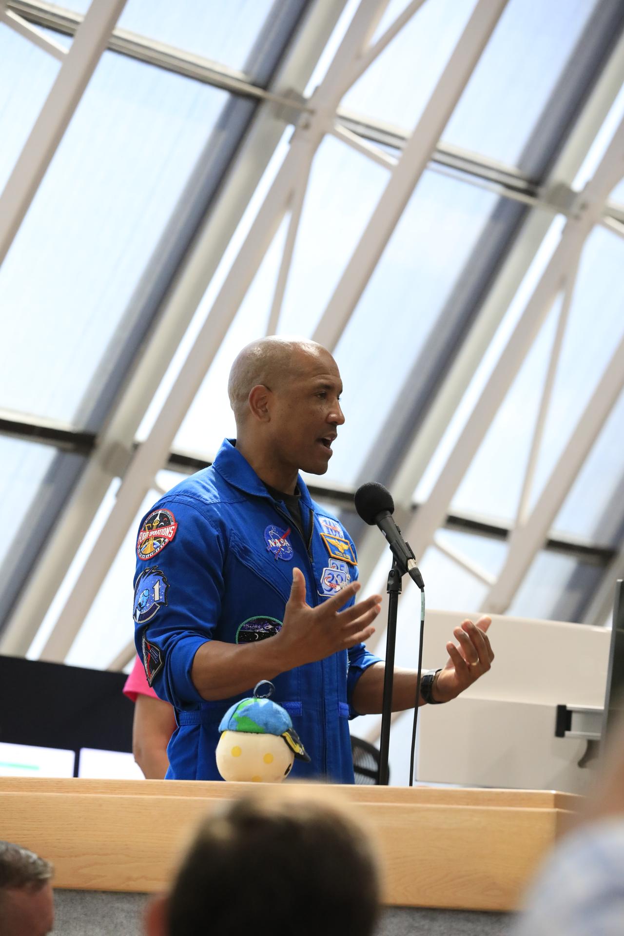 Artemis II NASA astronaut Victor Glover speaks to agency employees inside the Rocco A. Petrone Launch Control Center at NASA’s Kennedy Space Center in Florida on Tuesday, July 7, 2026. The Artemis II crew, Glover, fellow NASA astronauts Reid Wiseman and Christina Koch, and CSA (Canadian Space Agency) astronaut Jeremy Hansen, returned to NASA Kennedy for their first official visit since launch of Artemis II on Wednesday, April 1, 2026, to visit with the center’s workforce and tour facilities to view progress on Artemis III prelaunch processing.