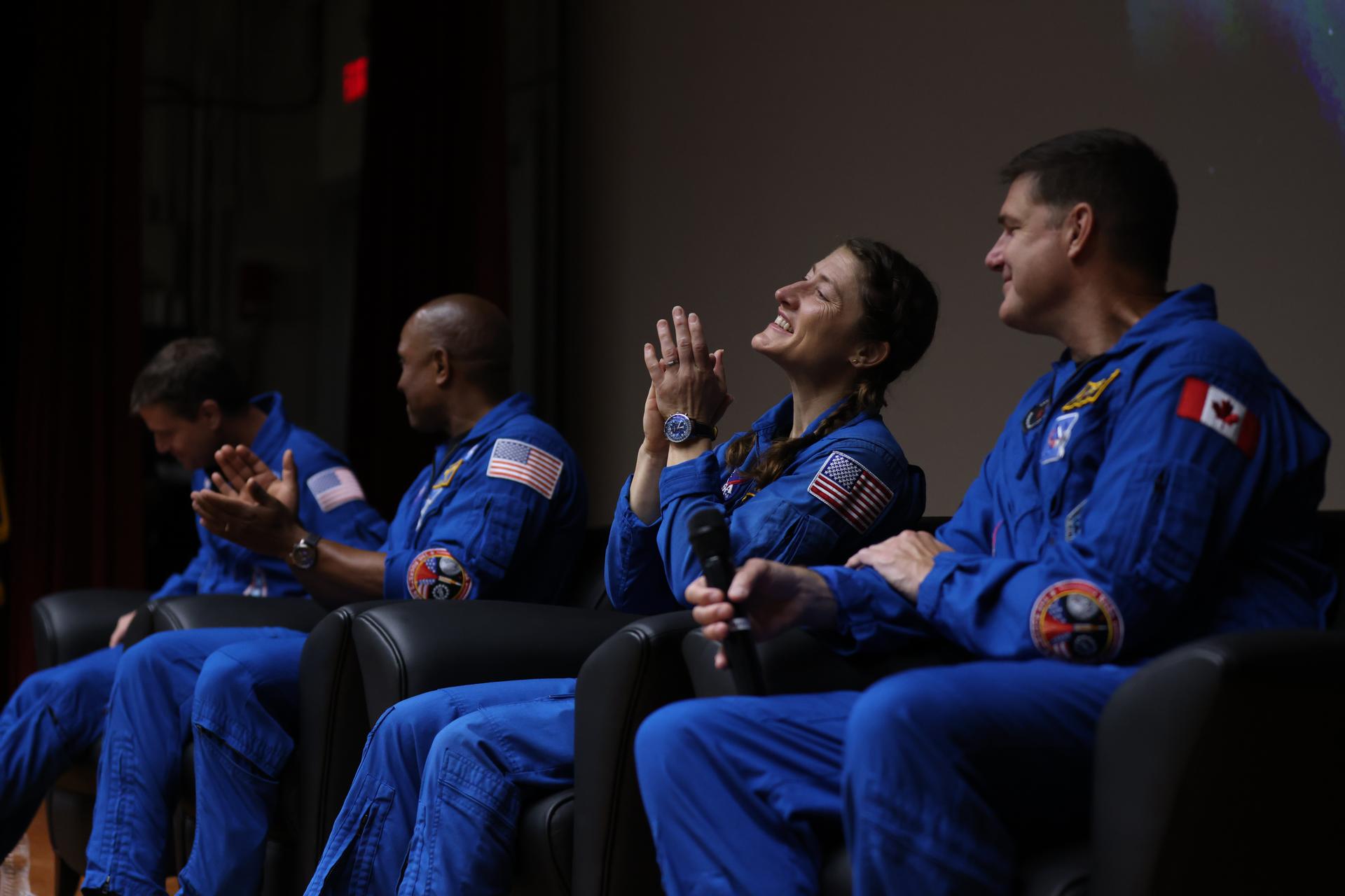 From left, Artemis II NASA astronauts Reid Wiseman, Victor Glover, Christina Koch, along with CSA (Canadian Space Agency) astronaut Jeremy Hansen speak to employees in the Training Auditorium at NASA’s Kennedy Space Center in Florida on Tuesday, July 7, 2026. The crew returned to NASA Kennedy for their first official visit since launch of Artemis II on Wednesday, April 1, 2026, to visit with the center’s workforce and tour facilities to view progress on Artemis III prelaunch processing.