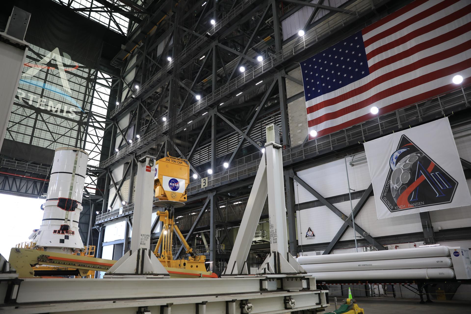 The right-hand aft assembly solid rocket booster segment for NASA’s Artemis III SLS (Space Launch System) rocket arrives at the agency’s Vehicle Assembly Building at NASA’s Kennedy Space Center in Florida on Thursday, July 9, 2026, ahead of stacking on top of the mobile launcher for the Artemis III mission. The twin boosters, manufactured by Northrop Grumman in Utah, will provide more than 75 percent of the SLS rocket’s total thrust at launch. The Artemis III mission will launch crew in the Orion spacecraft on top of the SLS rocket to test rendezvous and docking capabilities between Orion and commercial spacecraft needed to land astronauts on the Moon.