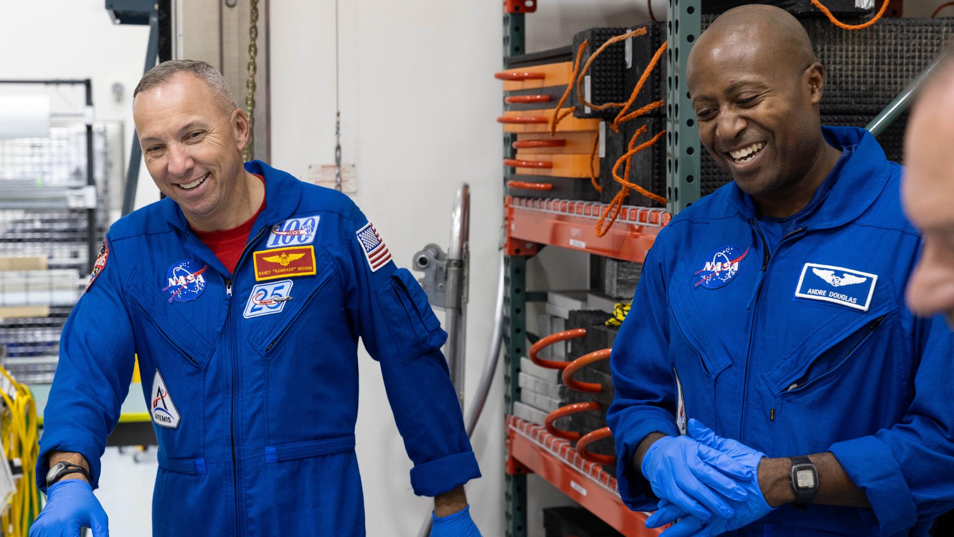 Artemis III crew members, NASA astronauts Randy Bresnick (left) and Andre Douglas get a close look Orion spacecraft hardware inside the Multi-Payload Processing Facility at NASA’s Kennedy Space Center in Florida on Friday, July 10, 2026. Bresnick, Douglas, NASA astronaut Frank Rubio, and ESA (European Space Agency) astronaut Luca Parmitano will launch aboard Orion on the Artemis III mission to conduct critical rendezvous and docking tests with lunar lander systems in low Earth orbit, advancing the capabilities needed before astronauts return to the lunar surface on Artemis IV.