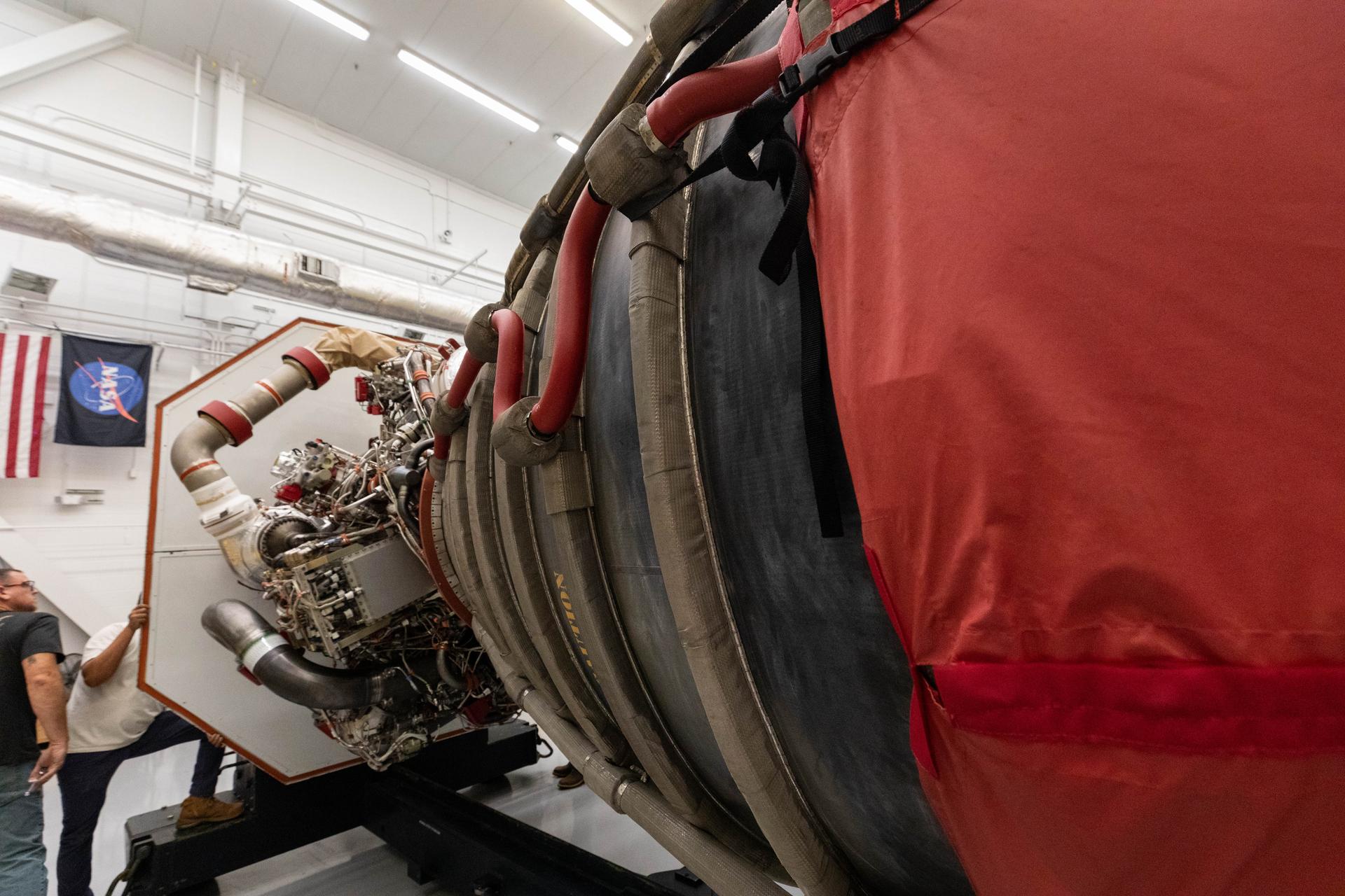 Teams at NASA’s Kennedy Space Center in Florida offload the third of four RS-25 SLS (Space Launch System) rocket engines built by L3 Harris Technologies for the agency's Artemis III mission on Tuesday, July 14, 2026, inside the spaceport’s Vehicle Assembly Building. The SLS rocket will use four RS-25 engines in the core stage to propel the Orion spacecraft into orbit providing over two million pounds of thrust at liftoff. As part of the Golden Age of innovation and exploration, NASA will send Artemis astronauts on increasingly difficult missions to explore more of the Moon for scientific discovery and economic benefits, establish an enduring human presence on the lunar surface, and build on our foundation for the first crewed missions to Mars.