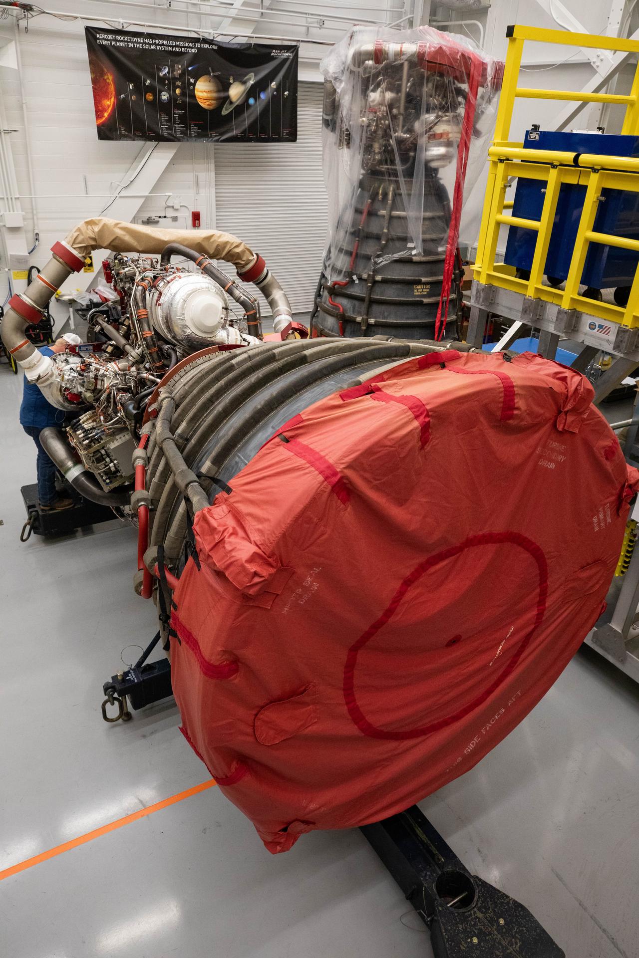 Teams at NASA’s Kennedy Space Center in Florida offload the third of four RS-25 SLS (Space Launch System) rocket engines built by L3 Harris Technologies for the agency's Artemis III mission on Tuesday, July 14, 2026, inside the spaceport’s Vehicle Assembly Building. The SLS rocket will use four RS-25 engines in the core stage to propel the Orion spacecraft into orbit providing over two million pounds of thrust at liftoff. As part of the Golden Age of innovation and exploration, NASA will send Artemis astronauts on increasingly difficult missions to explore more of the Moon for scientific discovery and economic benefits, establish an enduring human presence on the lunar surface, and build on our foundation for the first crewed missions to Mars.