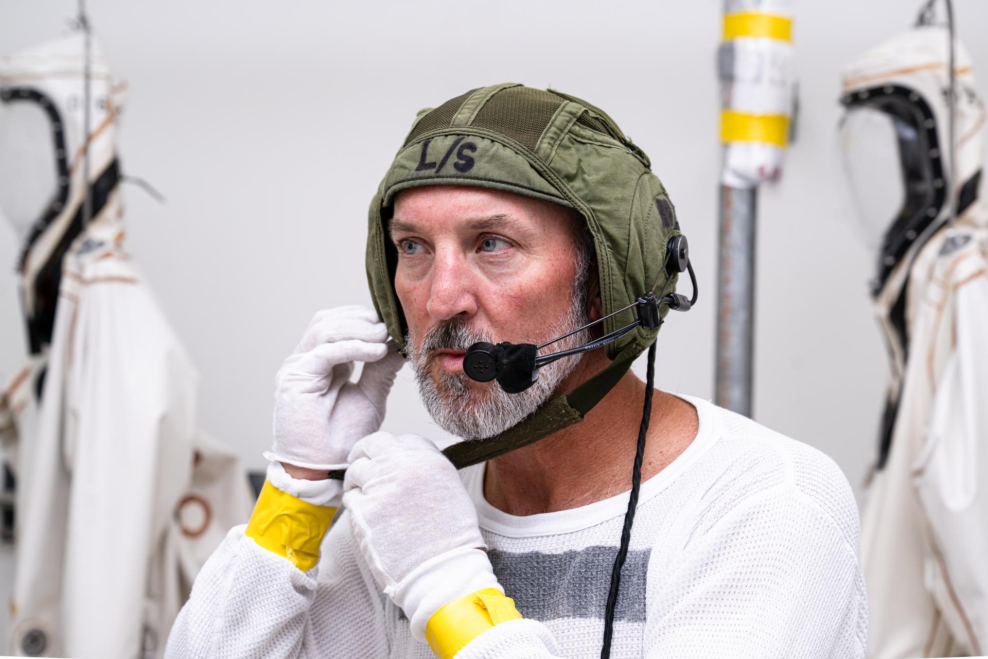 Ryan Renehan, technician, wears a Self-Contained Atmospheric Protective Ensemble (SCAPE) suit as he prepares to perform propellant loading operations inside the Payload Hazardous Servicing Facility at NASA’s Kennedy Space Center in Florida Thursday, July 23, 2026. With fuel tanks capable of carrying about 290 gallons (roughly 1,100 liters) of hydrazine – a monopropellant not requiring a second chemical to combust – Roman’s primary mission is to settle essential questions about dark energy, exoplanets, and infrared astrophysics by conducting wide-field surveys that explore the universe’s structure, evolution, and composition. Liftoff atop a SpaceX Falcon Heavy rocket from NASA Kennedy’s Launch Complex 39A is targeted no earlier than Sunday, Aug. 30, 2026.
