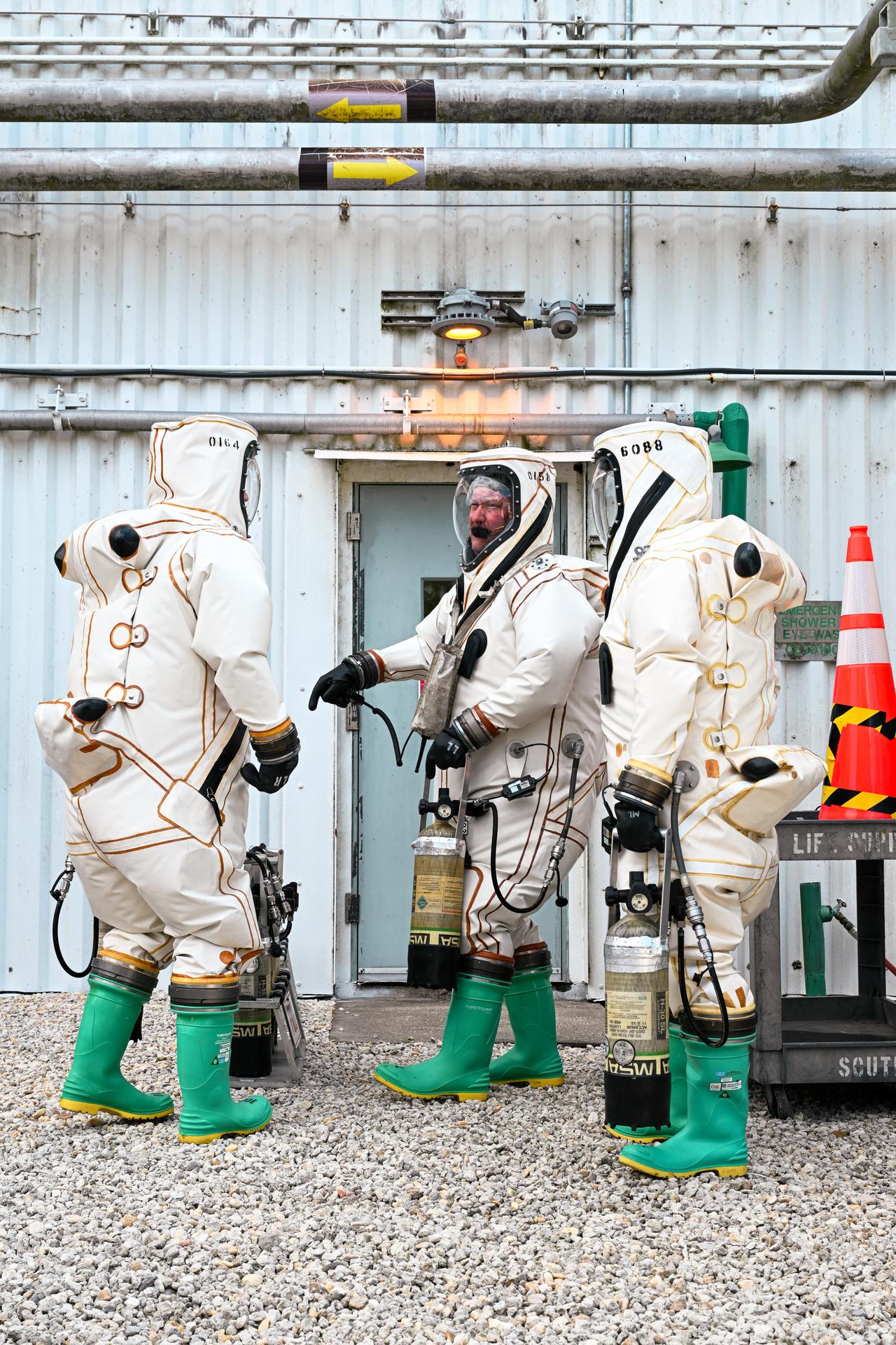 Technicians wear Self-Contained Atmospheric Protective Ensemble (SCAPE) suits as they prepare to perform propellant loading operations inside the Payload Hazardous Servicing Facility at NASA’s Kennedy Space Center in Florida Friday, July 24, 2026. With fuel tanks capable of carrying about 290 gallons (roughly 1,100 liters) of hydrazine – a monopropellant not requiring a second chemical to combust – Roman’s primary mission is to settle essential questions about dark energy, exoplanets, and infrared astrophysics by conducting wide-field surveys that explore the universe’s structure, evolution, and composition. Liftoff atop a SpaceX Falcon Heavy rocket from NASA Kennedy’s Launch Complex 39A is targeted no earlier than Sunday, Aug. 30, 2026.