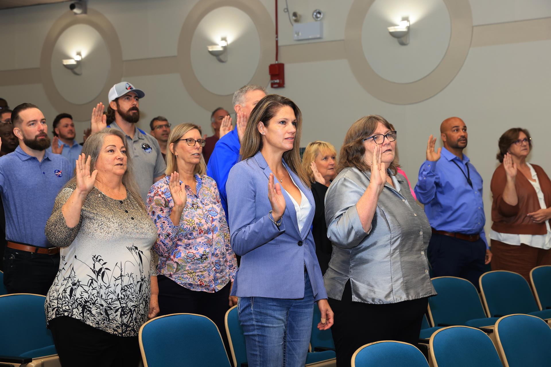 NASA’s Kennedy Space Center Director Brian Hughes swore in employees formerly from the Consolidated Operations, Management, Engineering, and Test (COMET) contract as new NASA civil servants on Monday, July 27, 2026, at NASA Kennedy in Florida. The latest round of civil servants is part of the administrator’s workforce directive to restore technical core competencies within the civil servants ranks.