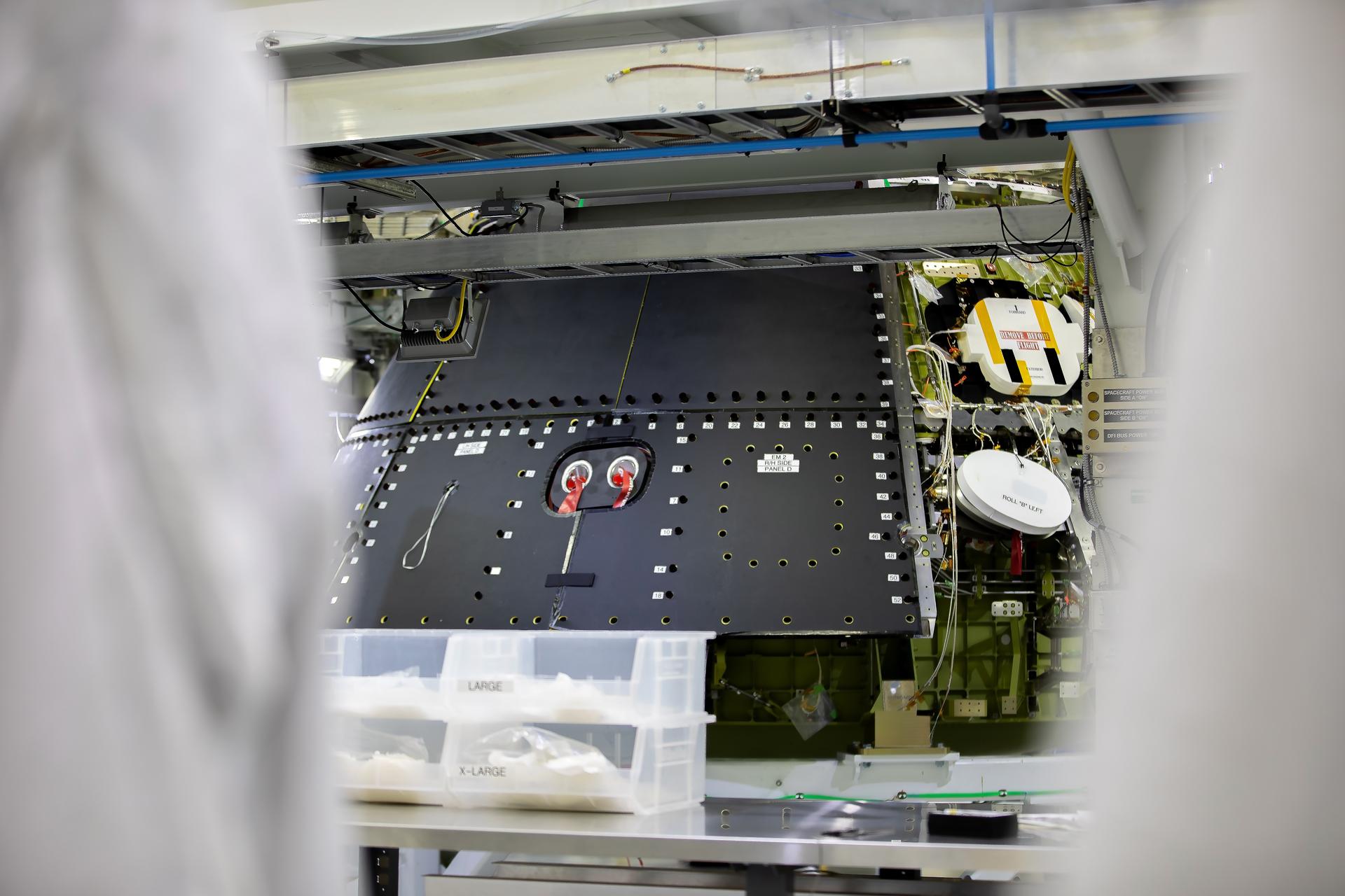 A photographer captures the Artemis IV Orion crew module on Friday, July 31, 2026, inside the Neil A. Armstrong Operations and Checkout Building at NASA’s Kennedy Space Center in Florida. There are currently several pieces of hardware from Artemis III, IV, and V undergoing processing at the same time inside the facility. Artemis IV will be one of the most complex undertakings of engineering and human ingenuity in the history of deep space exploration, exploring the lunar South Pole region. The astronauts’ observations, samples, and data collected will expand our understanding of our solar system and home planet, while inspiring the Artemis Generation.