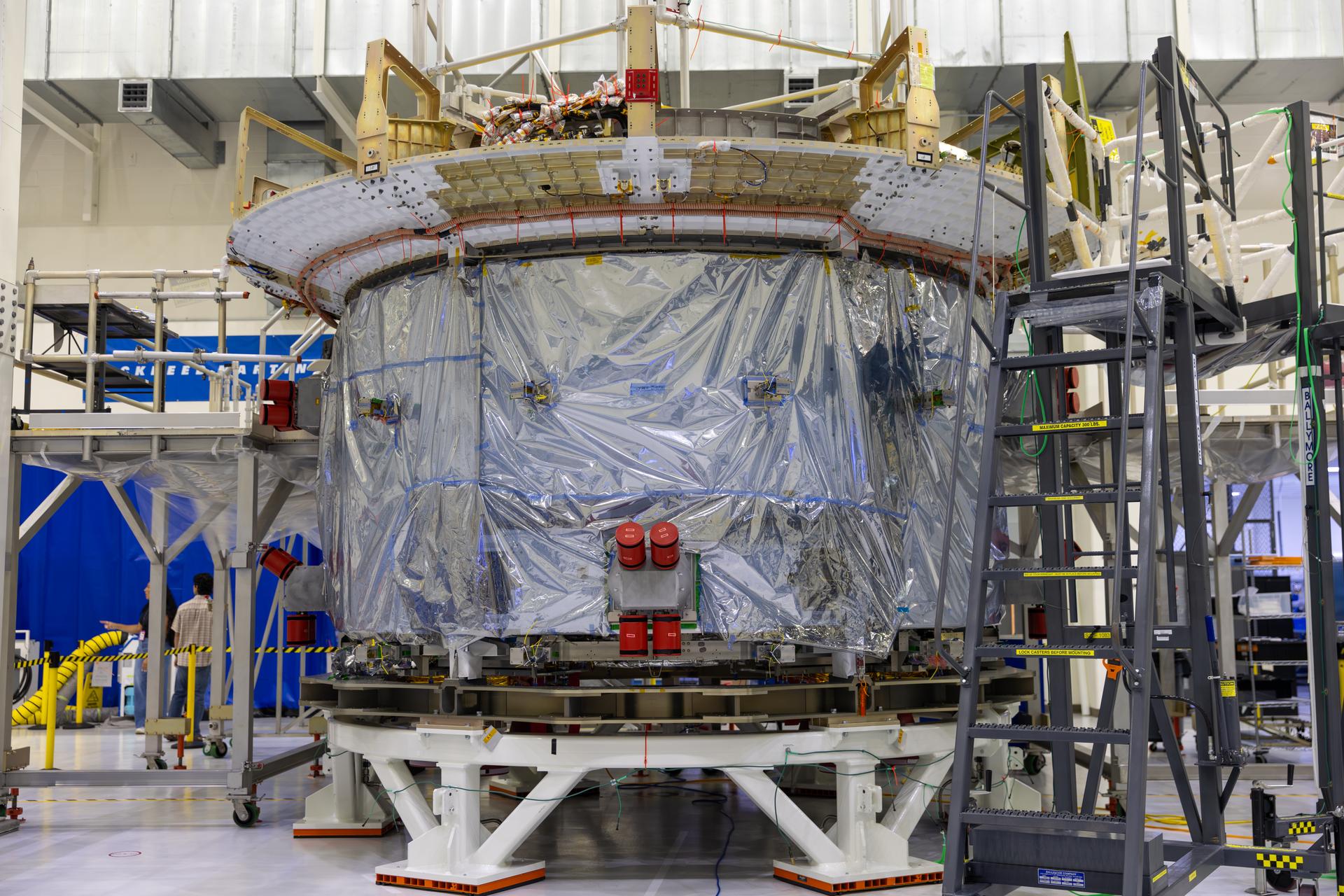 A photographer captures the Artemis IV European Service Module on Friday, July 31, 2026, inside the Neil A. Armstrong Operations and Checkout Building at NASA’s Kennedy Space Center in Florida. There are currently several pieces of hardware from Artemis III, IV, and V undergoing processing at the same time inside the facility. Artemis IV will be one of the most complex undertakings of engineering and human ingenuity in the history of deep space exploration, exploring the lunar South Pole region. The astronauts’ observations, samples, and data collected will expand our understanding of our solar system and home planet, while inspiring the Artemis Generation.