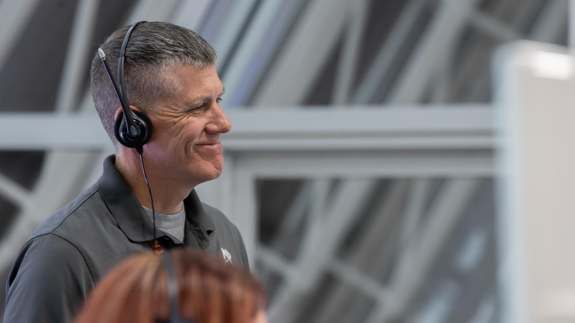 Jeremy Graeber, assistant launch director, NASA’s Exploration Ground Systems Program, smiles during a cryogenic propellant loading simulation for NASA’s Artemis III mission on Wednesday, Aug. 5, 2026, inside Firing Rooms 1 and 2 of the Rocco A. Petrone Launch Control Center at the agency’s Kennedy Space Center in Florida. Members of NASA’s Exploration Ground Systems team rehearse the steps to load the super-cooled liquid hydrogen and liquid oxygen into the SLS (Space Launch System) rocket core stage, a process that starts several hours before liftoff for the Artemis III mission. Artemis III will carry out a series of objectives in low Earth orbit designed to demonstrate critical systems needed for future lunar landings, beginning with Artemis IV.