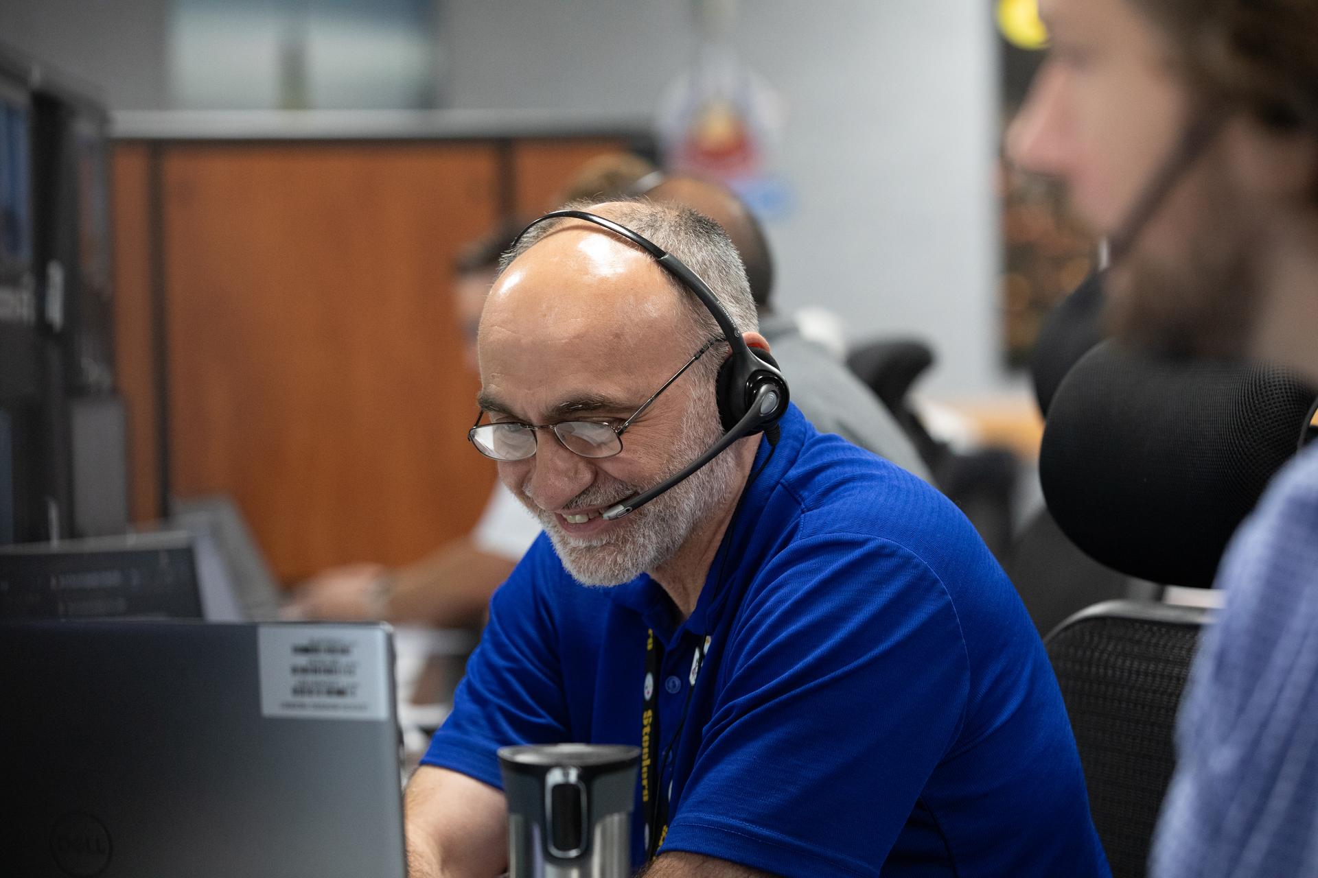Alex Pandelos, engineer with NASA’s Exploration Ground Systems Program, participates in a terminal countdown simulation for Artemis III on Thursday, Aug. 6, 2026, inside Firing Room 1 of the Rocco A. Petrone Launch Control Center at NASA’s Kennedy Space Center in Florida. The terminal count simulation conducted by NASA’s Exploration Ground Systems team runs through the final five hours of launch countdown, including terminal count - the remaining 10 minutes of the countdown.  Artemis III will carry out a series of objectives in low Earth orbit designed to demonstrate critical systems needed for future lunar landings, beginning with Artemis IV. 