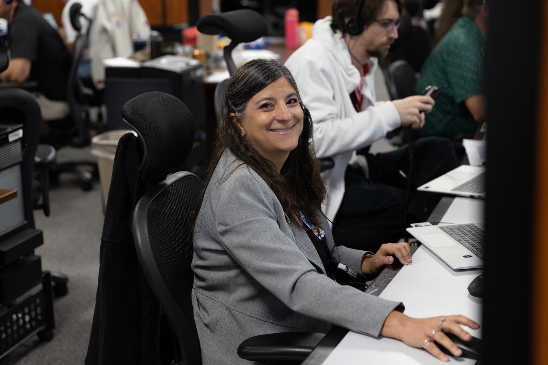 Lindsey Waitt, engineer with NASA’s Exploration Ground Systems Program, participates in a terminal countdown simulation for Artemis III on Thursday, Aug. 6, 2026, inside Firing Room 1 of the Rocco A. Petrone Launch Control Center at NASA’s Kennedy Space Center in Florida. The terminal count simulation conducted by NASA’s Exploration Ground Systems team runs through the final five hours of launch countdown, including terminal count - the remaining 10 minutes of the countdown.  Artemis III will carry out a series of objectives in low Earth orbit designed to demonstrate critical systems needed for future lunar landings, beginning with Artemis IV.