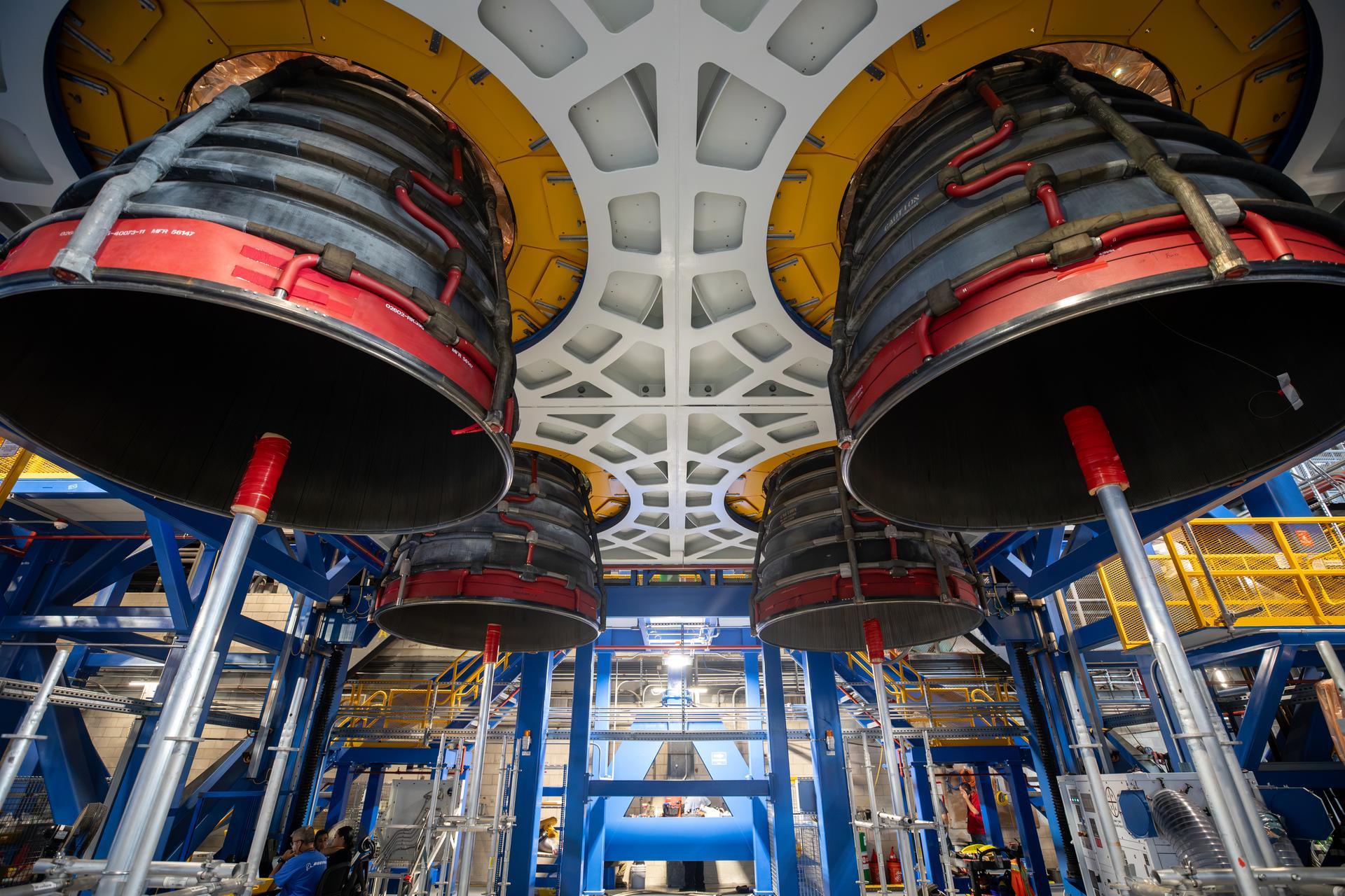 Technicians complete installation of all four RS-25 SLS (Space Launch System) rocket engines on the work stand for integration with the Artemis III core stage rocket on Tuesday, Sept. 1, 2026, inside the Vehicle Assembly Building at NASA’s Kennedy Space Center in Florida. During Artemis III, the four RS-25 engines will launch SLS, the Orion spacecraft and its crew of four into low Earth orbit, generating more than two million pounds of thrust at liftoff.
