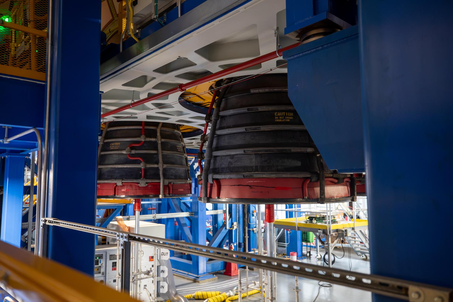 Technicians complete installation of all four RS-25 SLS (Space Launch System) rocket engines on the work stand for integration with the Artemis III core stage rocket on Tuesday, Sept. 1, 2026, inside the Vehicle Assembly Building at NASA’s Kennedy Space Center in Florida. During Artemis III, the four RS-25 engines will launch SLS, the Orion spacecraft and its crew of four into low Earth orbit, generating more than two million pounds of thrust at liftoff.