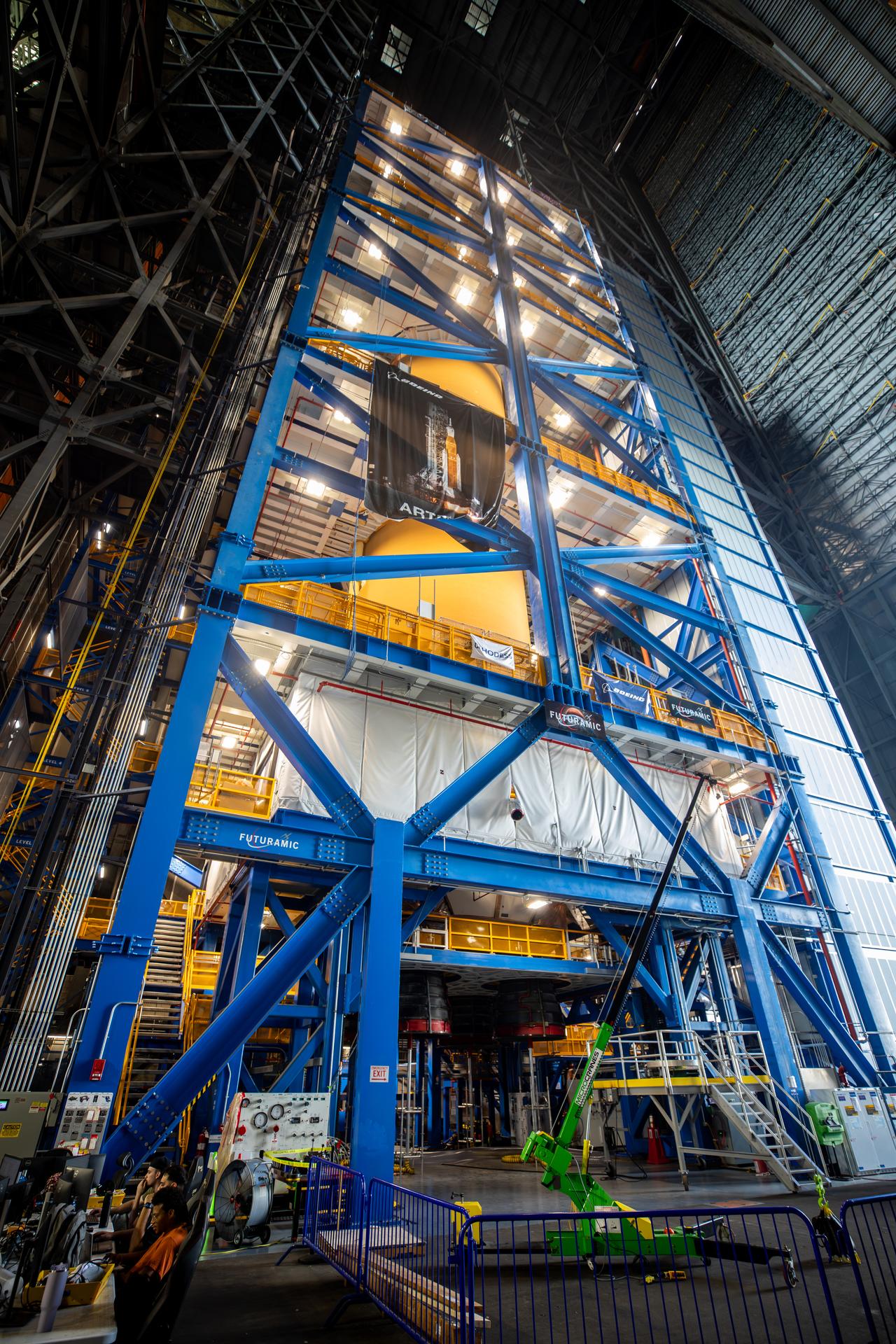 Technicians complete installation of all four RS-25 SLS (Space Launch System) rocket engines on the work stand for integration with the Artemis III core stage rocket on Tuesday, Sept. 1, 2026, inside the Vehicle Assembly Building at NASA’s Kennedy Space Center in Florida. During Artemis III, the four RS-25 engines will launch SLS, the Orion spacecraft and its crew of four into low Earth orbit, generating more than two million pounds of thrust at liftoff.