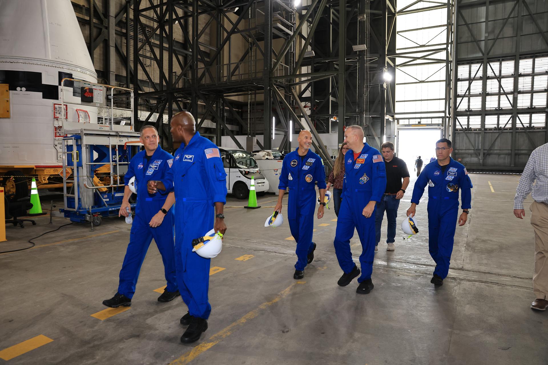 The Artemis III primary and back-up crew members visit the Vehicle Assembly Building at NASA's Kennedy Space Center in Florida on Wednesday, Sept. 2, 2026. From left, NASA astronauts Bob Hines and Andre Douglas, ESA (European Space Agency) astronaut Luca Parmitano, and NASA astronauts Randy Bresnik and Frank Rubio viewed the work progress on the Artemis III SLS (Space Launch System) rocket core stage inside High Bay 2 and the solid rocket booster integration inside High Bay 3. This marked the first visit to Kennedy by the entire crew and backup crew members. Artemis III will launch four crew members aboard the Orion spacecraft to carry out a series of objectives in low Earth orbit designed to demonstrate critical systems needed for future lunar landings, beginning with Artemis IV.