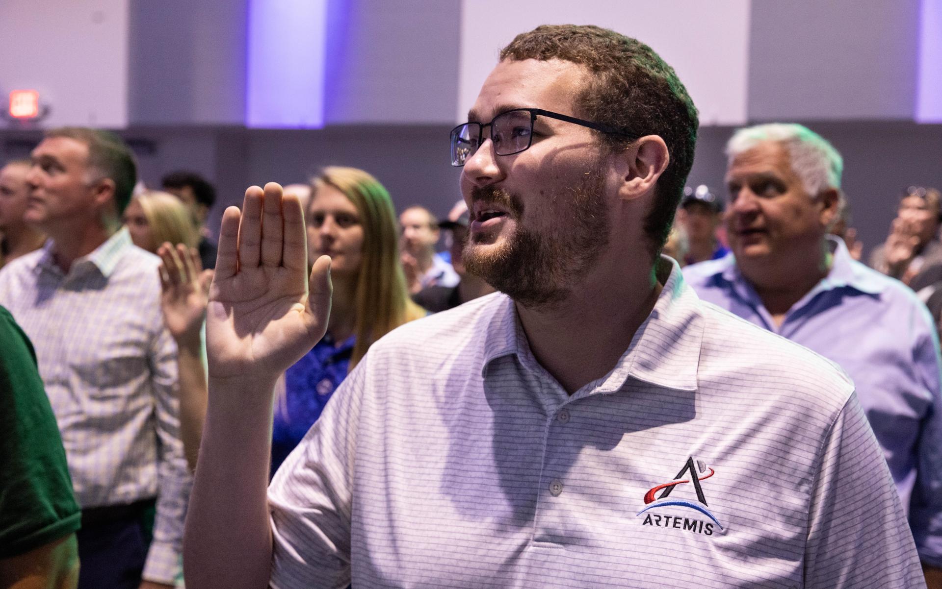 NASA’s newest civil servants participate in a swearing-in ceremony on Tuesday, Sept. 8, 2026, inside the Astronauts Memorial Foundation’s Center for Space Education at the Kennedy Space Center Visitor Complex in Florida. The ceremony featured the swearing in of employees formerly from the Consolidated Operations, Management, Engineering, and Test (COMET) contract, as well as outside hires, as part of the administrator’s workforce directive to restore technical core competencies within the civil servants ranks.    