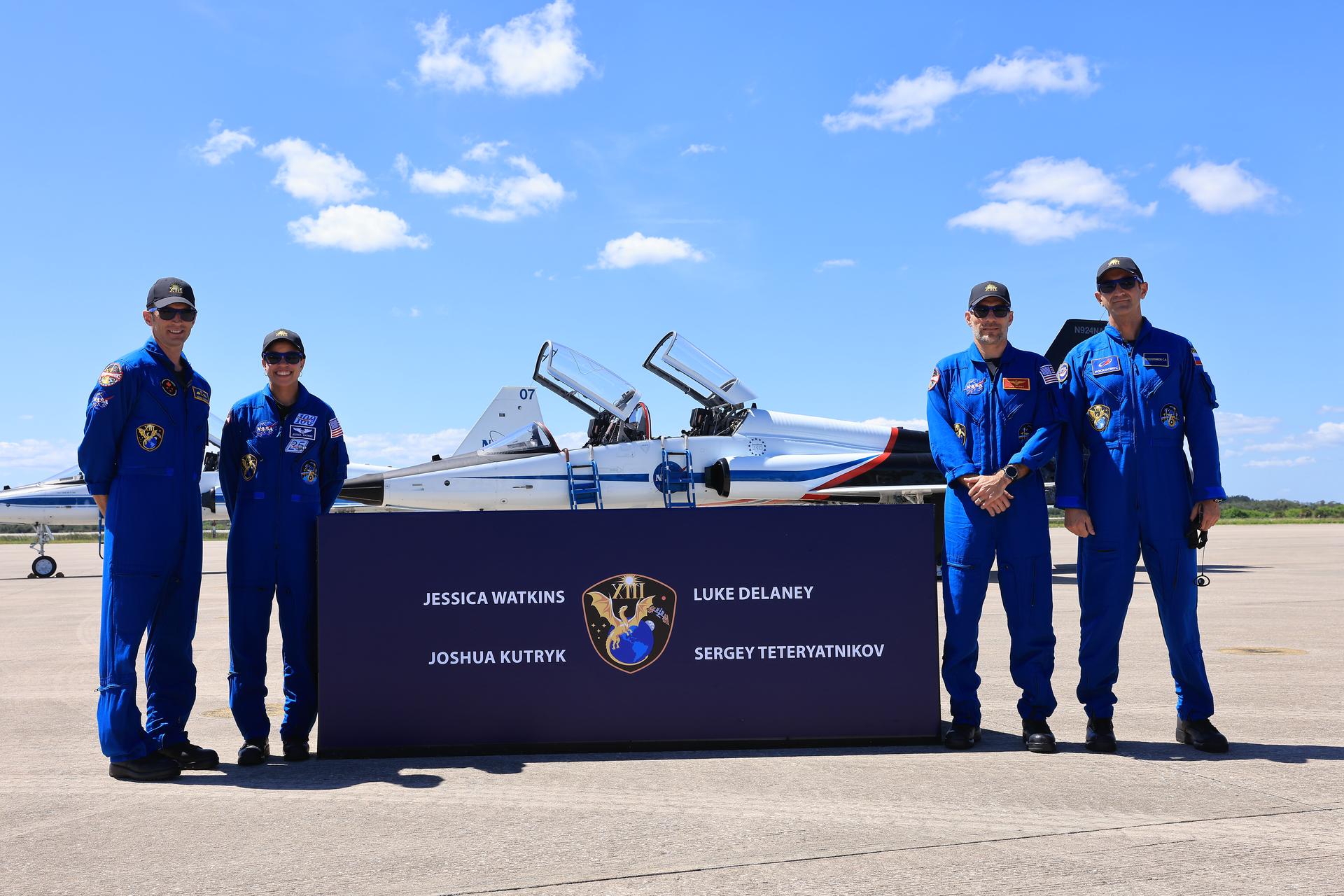 From left, crew members of NASA’s SpaceX Crew-13 mission, CSA (Canadian Space Agency) astronaut Joshua Kutryk, NASA astronaut Jessica Watkins, NASA astronaut Luke Delaney, and Roscosmos cosmonaut Sergey Teteryatnikov arrive Saturday, Sept. 26, 2026, at the Shuttle Landing Facility at the agency’s Kennedy Space Center in Florida. The Crew-13 mission is slated to launch to the International Space Station aboard SpaceX’s Dragon spacecraft atop company’s Falcon 9 rocket from Cape Canaveral Space Force Station’s Space Launch Complex 40 at 11:10 a.m. EDT on Thursday, Oct. 1. 